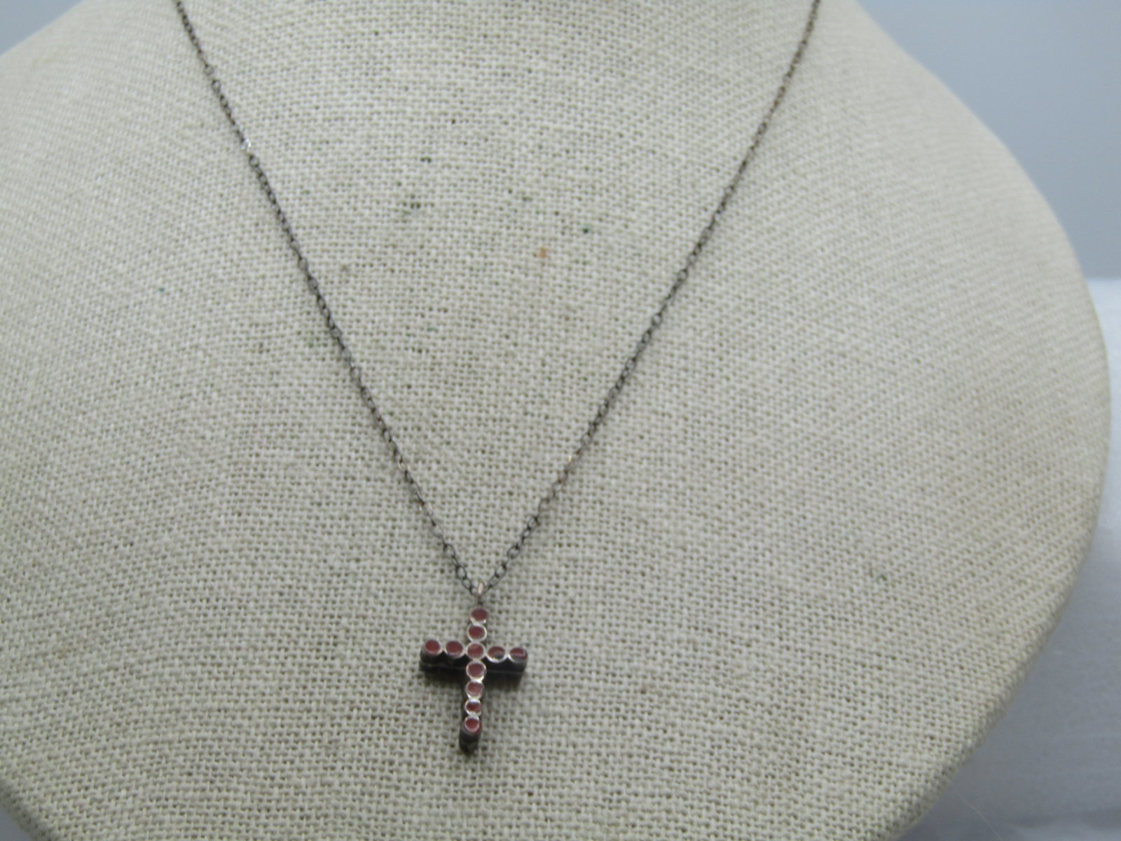 Vintage Sterling Southwestern Coral & Turquoise Cross Necklace, 16": Vintage Sterling Southwestern Coral & Turquoise Cross Necklace, 16". The cross is appx. 3/4" long and just over 1/2: wide. It is made up of inlaid turquoise rounds on one side and red coral on the oth