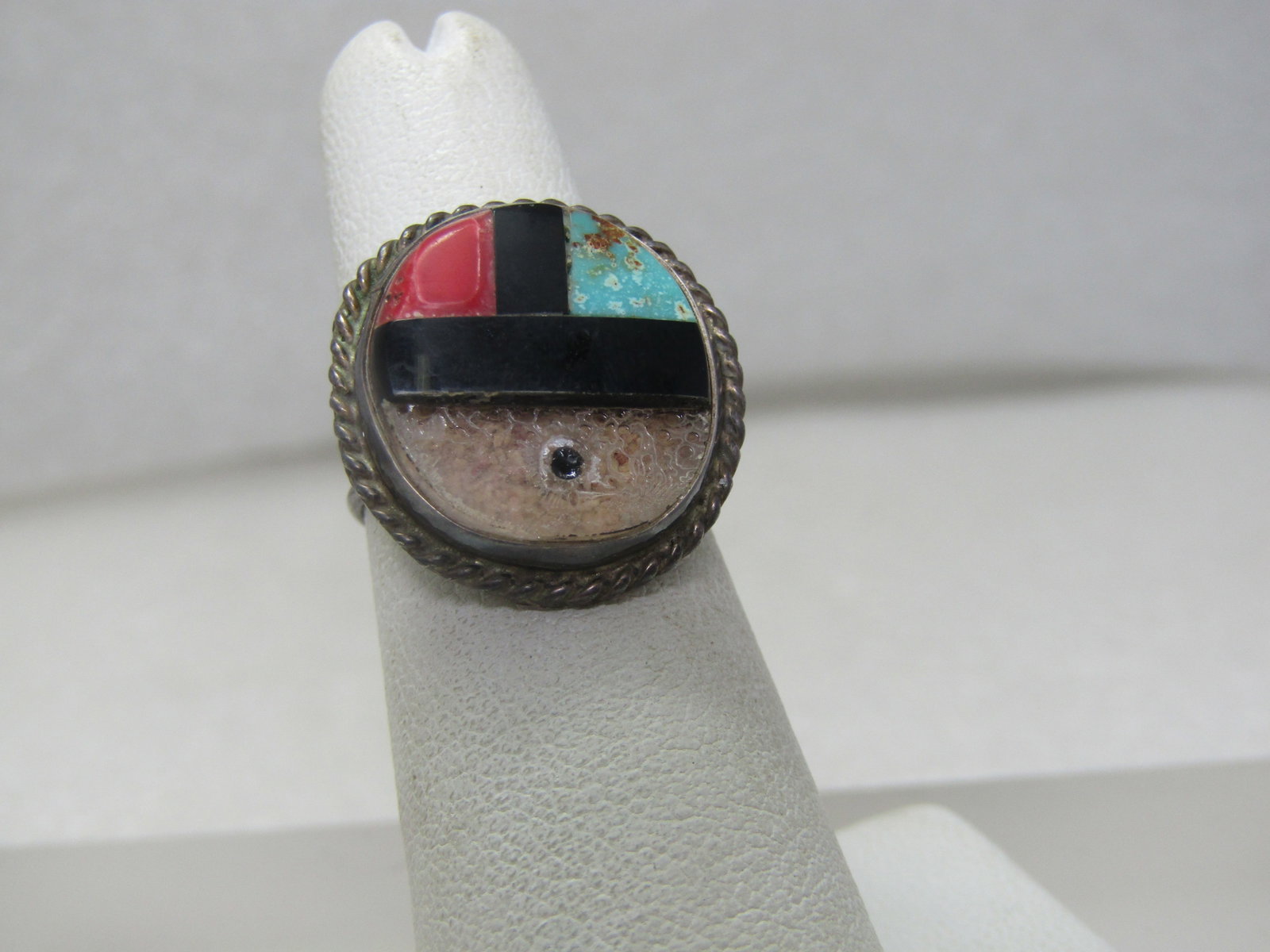 Vintage Sterling Zuni Sunface Ring (for repair), Sz. 8.5: Vintage Sterling Zuni Sunface Ring (for repair), Sz. 8.5. This is an appx. 1960's-1970's ring - the top mother-of-pearl piece is missing. It has inlaid onyx, turquoise, and coral but is missing the to
