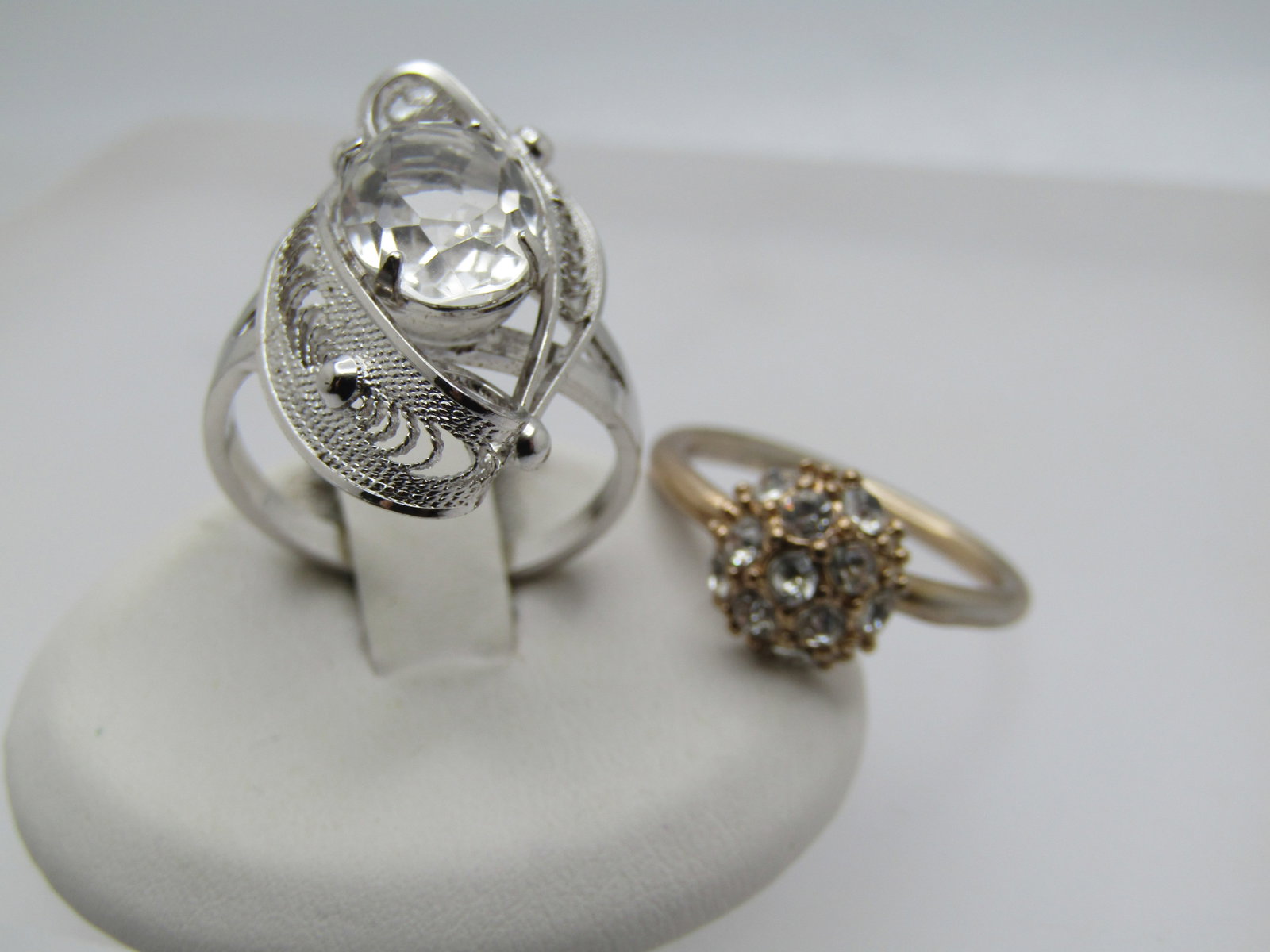 Vintage Sterling Filigree White Topaz Ring, Signed Sorrento, Sz. 7.75, 1 Costume Rhinestone Ring,: Vintage Sterling Filigree White Topaz Ring, Signed Sorrento, Sz. 7.75, 1 Costume Rhinestone Ring, Sz. 7, 1970's-1980's. The sorrent ring has a bypass filigree leaf-like design on each side of the ston