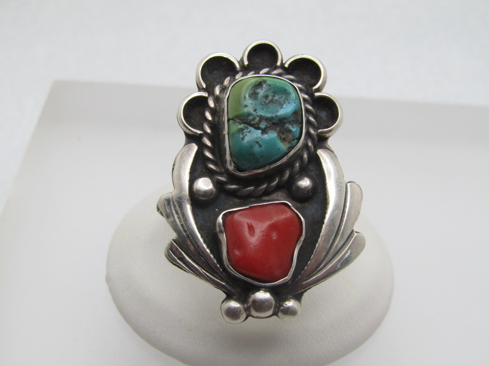 Vintage Sterling Southwestern Turquoise & Coral Ring, Adj. 5-12, Unisex, 1960's-1970's: Vintage Sterling Southwestern Turquoise & Coral Ring, Adj. 5-12, Unisex, 1960's-1970's. this has a bezel-set turquoise and coral nugget. They are appx. 12mm and 8.5mm long. The turquoise is largaer