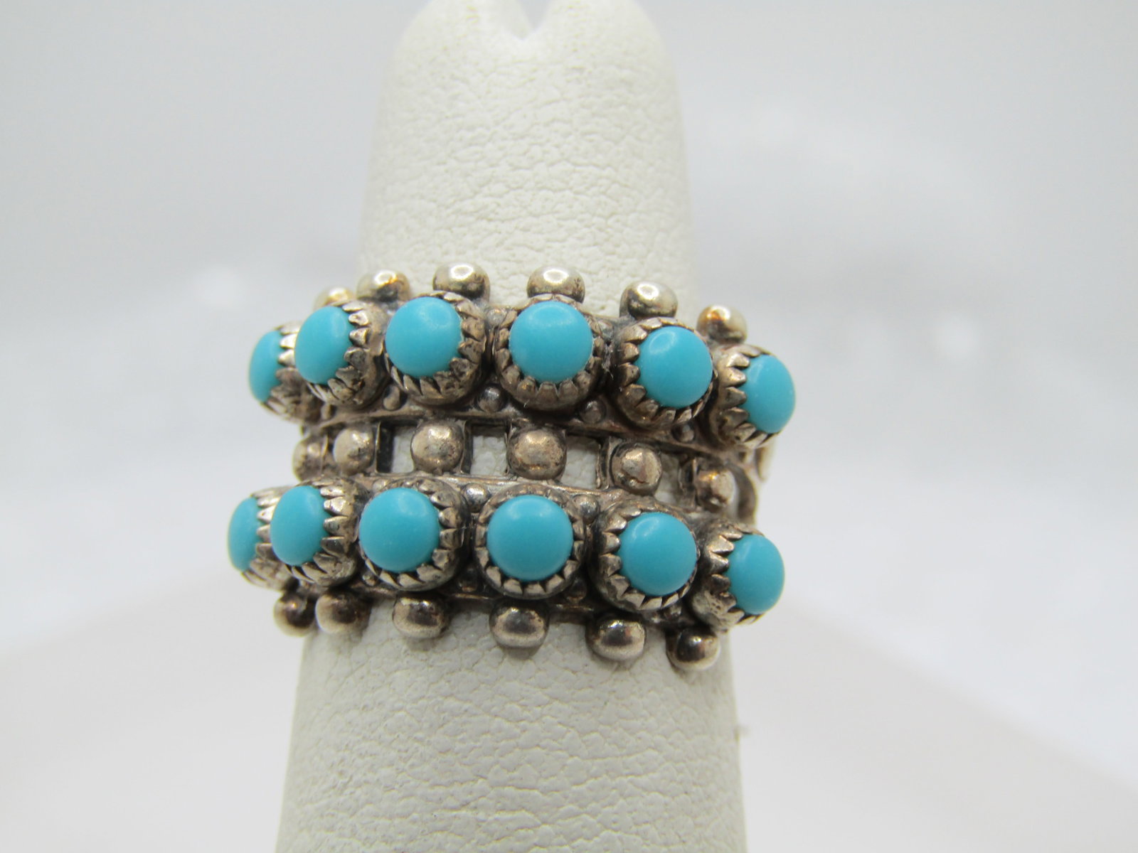 Vintage Sterling Turquoise Snake Eye Ring, Sz. 4.5, Signed Juan Pedro Garcia: Vintage Sterling Turquoise Snake Eye Ring, Sz. 4.5, Signed Juan Pedro Garcia. Navajo silver artist. This ring has two rows of 3mm turquoise snake eye stones that are set in a sawtooth bezel setting, t