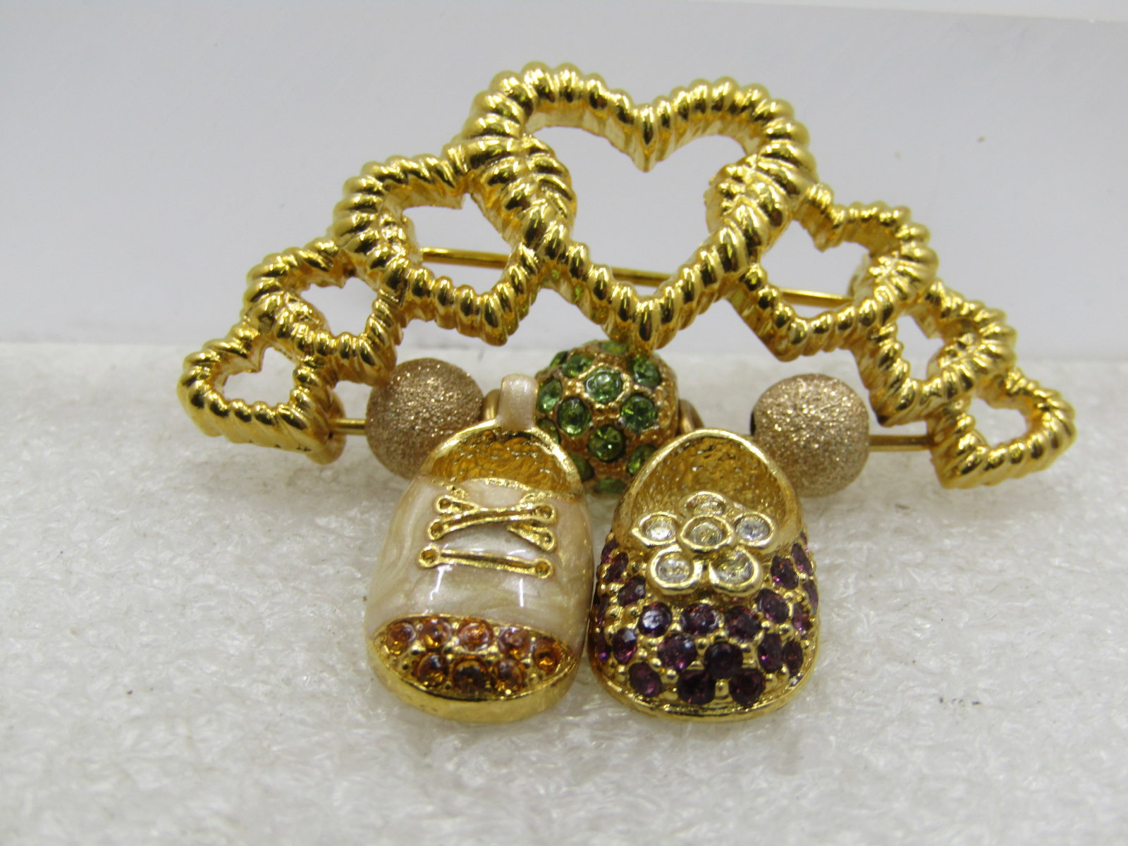 Vintage Firenza Grandma>/Mother's Brooch, Hearts & Children's Rhinestone Shoes: Vintage Firenza Grandma or Mother's Brooch, Hearts & Children's Rhinestone Shoes. Signed Firenza and Italy. This has graduated gold tone hearts over the top fo the brooch with a pin that holds two gli