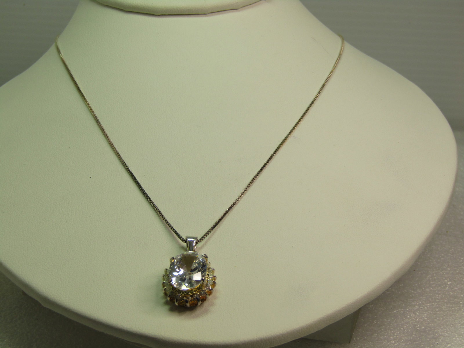 Sterling SIlver Rock Crystal Quartz Halo Necklace, 18", Signed JC, 1990's: Sterling SIlver Clear Rock Crystal Quartz Halo Necklace, 18", Signed JC, 1990's. The stone in the pendant is a large clear stone that is testing in the quartz family. The stone is an oval cut and is a