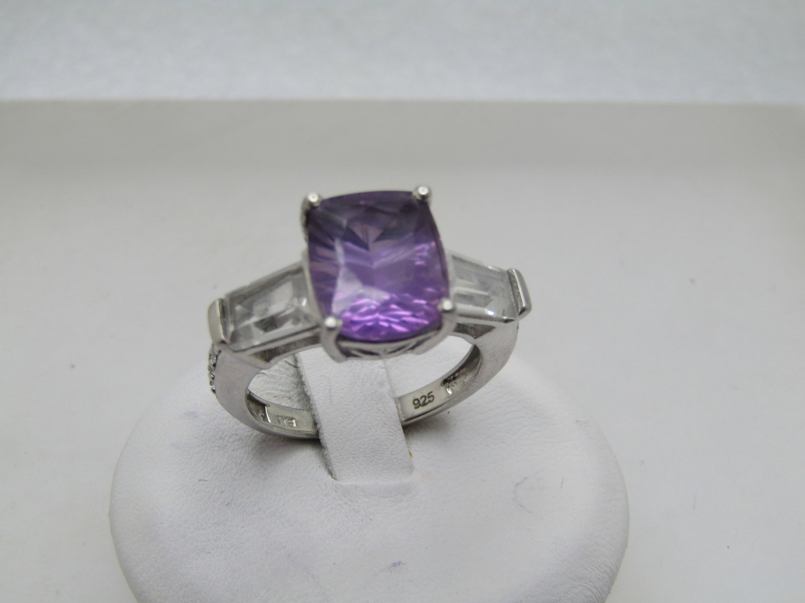 Vintage Sterling Amethyst Whtie Topaz Ring, Sz. 7, 1990's, Signed: Vintage Sterling Amethyst Whtie Topaz Ring, Sz. 7, 1990's, Signed STS. The amethyst is a cushion cut rectangular stone that is appx. 3.10 ctw. On each side is a large baguette that is testing as