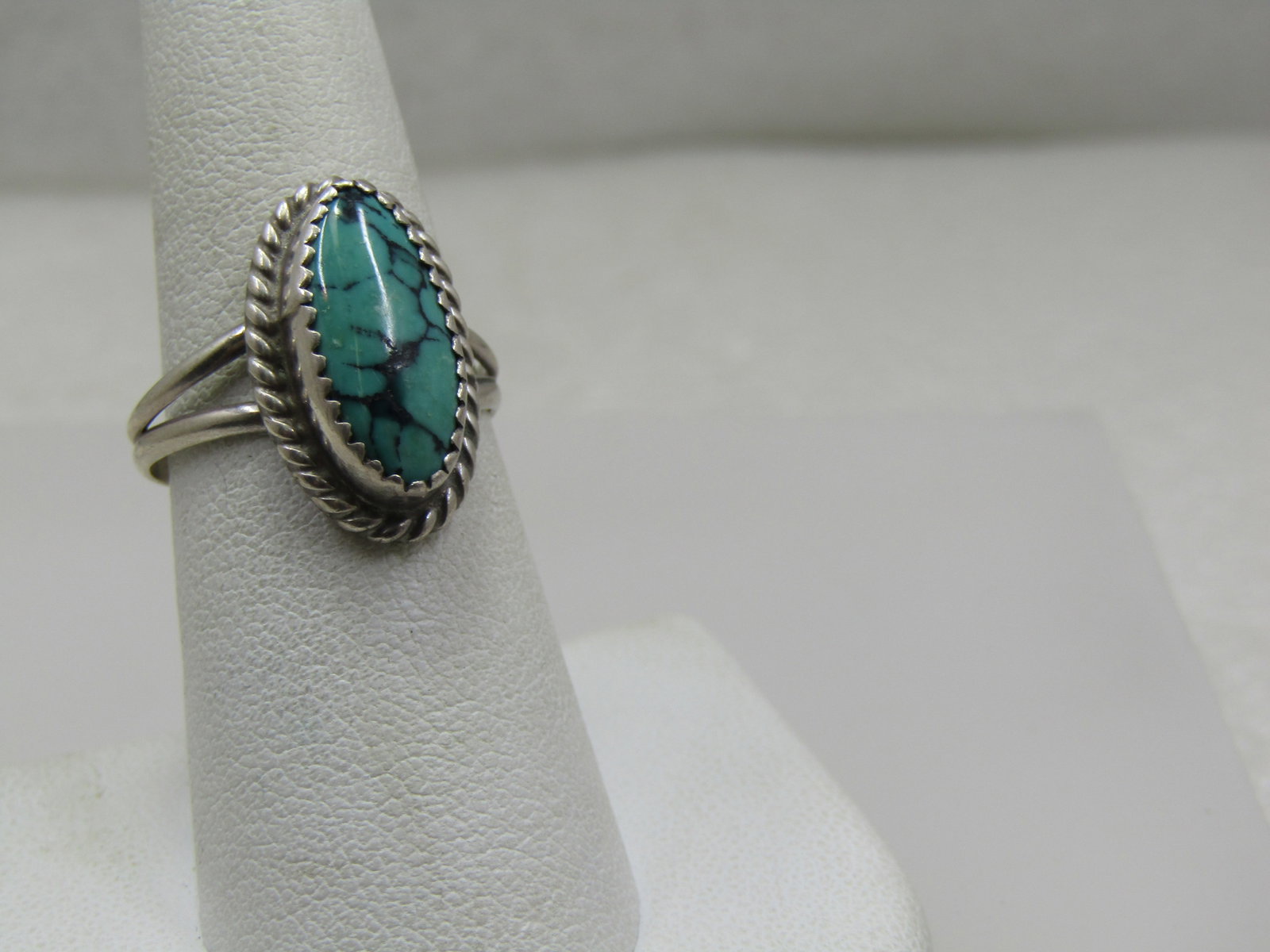 Vintage Sterling Southwestern Turquoise Ring, Signed C.B., Sz. 7.25: Vintage Sterling Southwestern Turquoise Ring, Signed C.B., Sz. 7.25. C.B. Sterling can be Clarence Bailon by research and matching the mark. This has a turquoise stone with black veining. The stone is