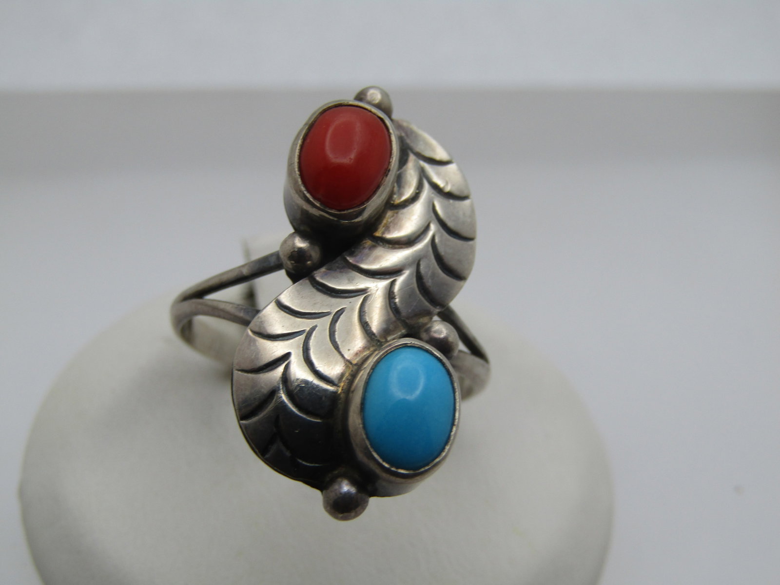Vintage Sterling Southwestern Turquoise Coral Ring, Sz. 9, 1970's-1980's, Signed: Vintage Sterling Southwestern Turquoise Coral Ring, Sz. 9, 1970's-1980's, Signed with what looks like a wide W. The ring has a turquoise and coral oval bezel-set apx. 6mm stone that is set raised over