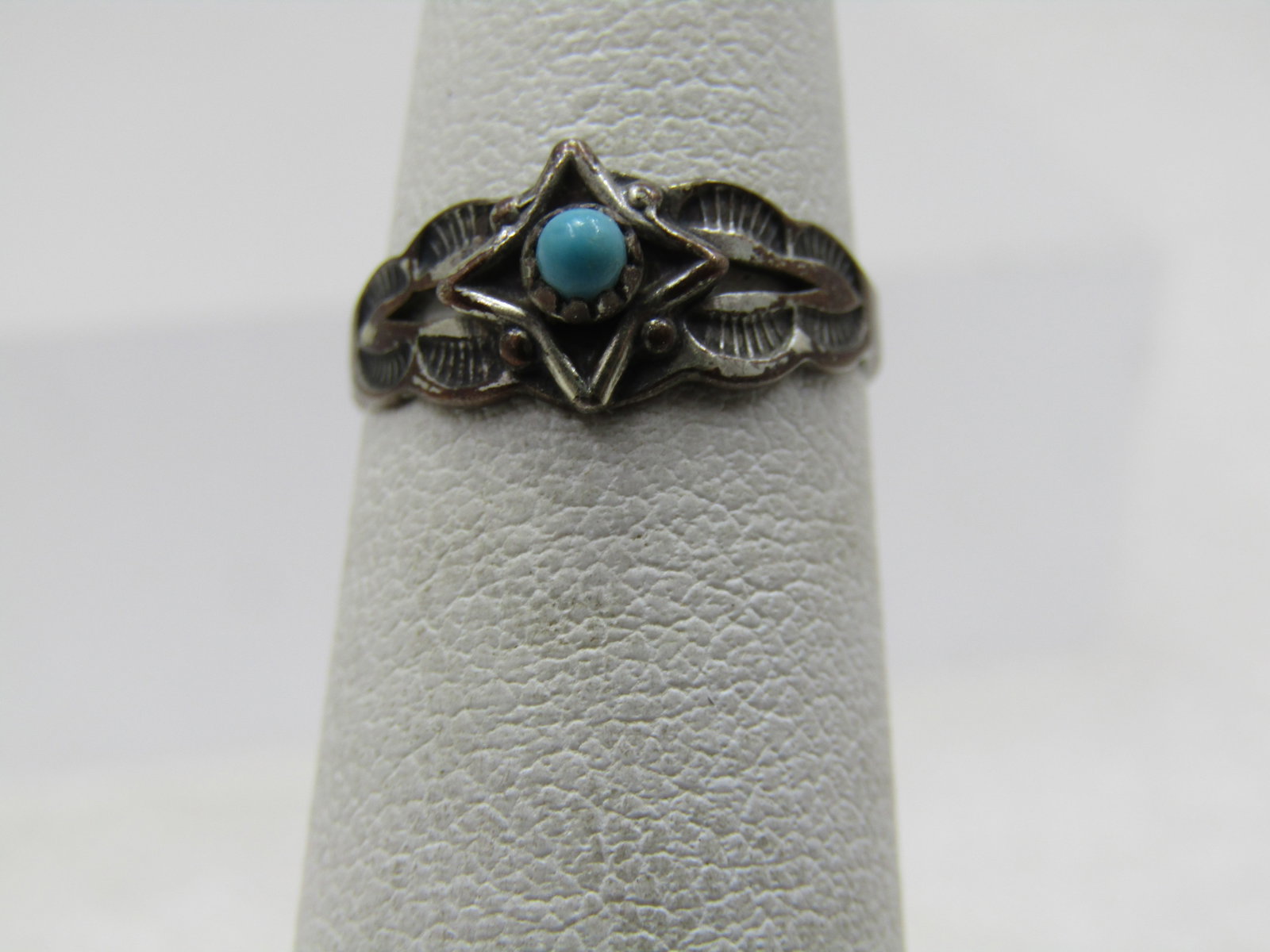 Vintage Sterling Southwestern turquoise Snakeye Ring, Sz. 3, Bell Trading, Mid-Century: Vintage Sterling Southwestern turquoise Snakeye Ring, Sz. 3, Bell Trading, 1960's. The ring tests as sterling with a weight of .95 grams. It is also marked sterling. It is a petite ring at sz. 3 with 