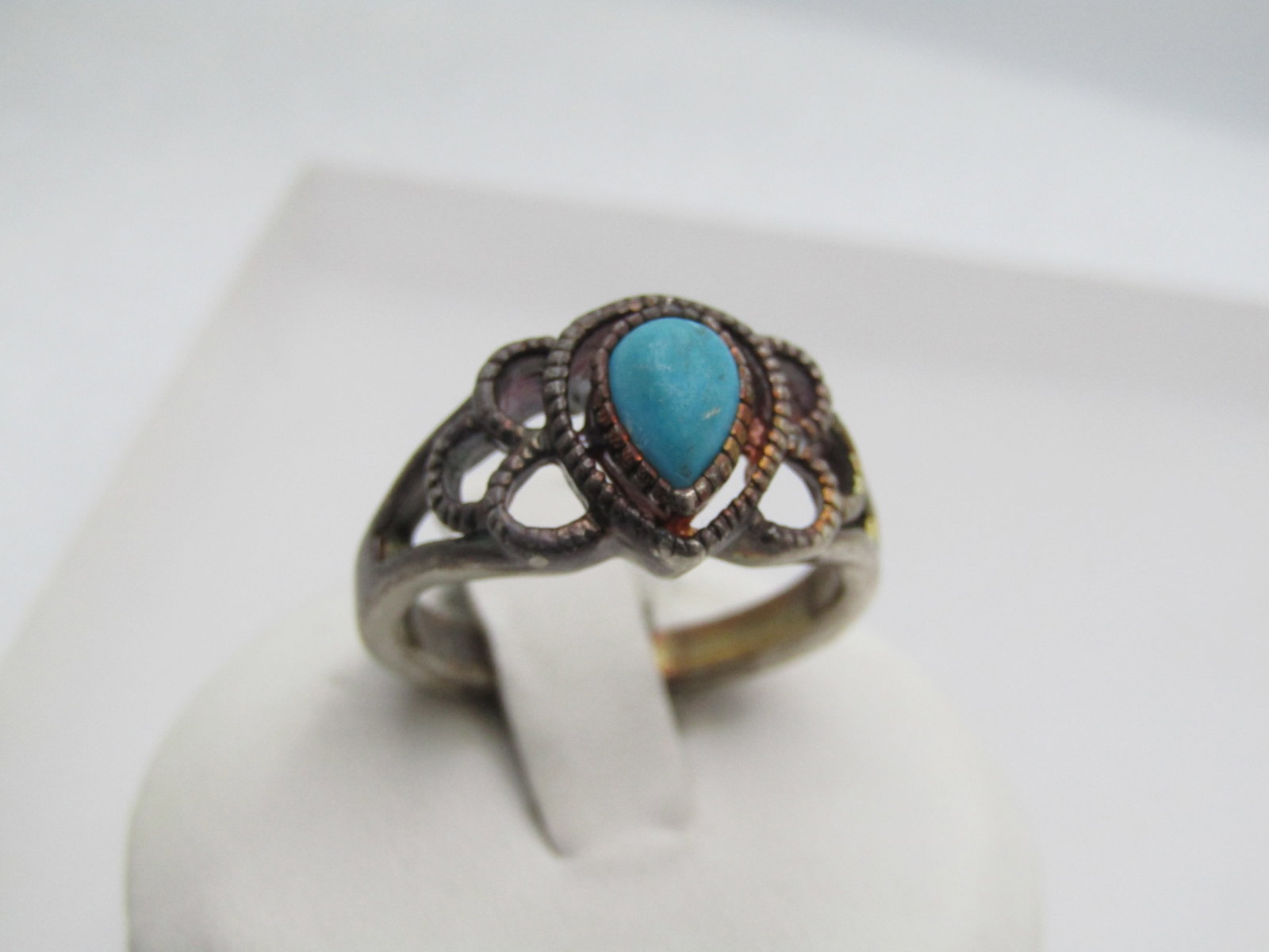 Vintage Sterling Faux Turquoise Ring, Southwestern Theme, Sz. 8, 1970's-1980's: Vintage Sterling Faux Turquoise Ring, Southwestern Theme, Sz. 8, 1970's-1980's. The ring is marked .925 and tests as sterling with a weight of appx. 4.99 gr. The stone is a teardrop stone that is