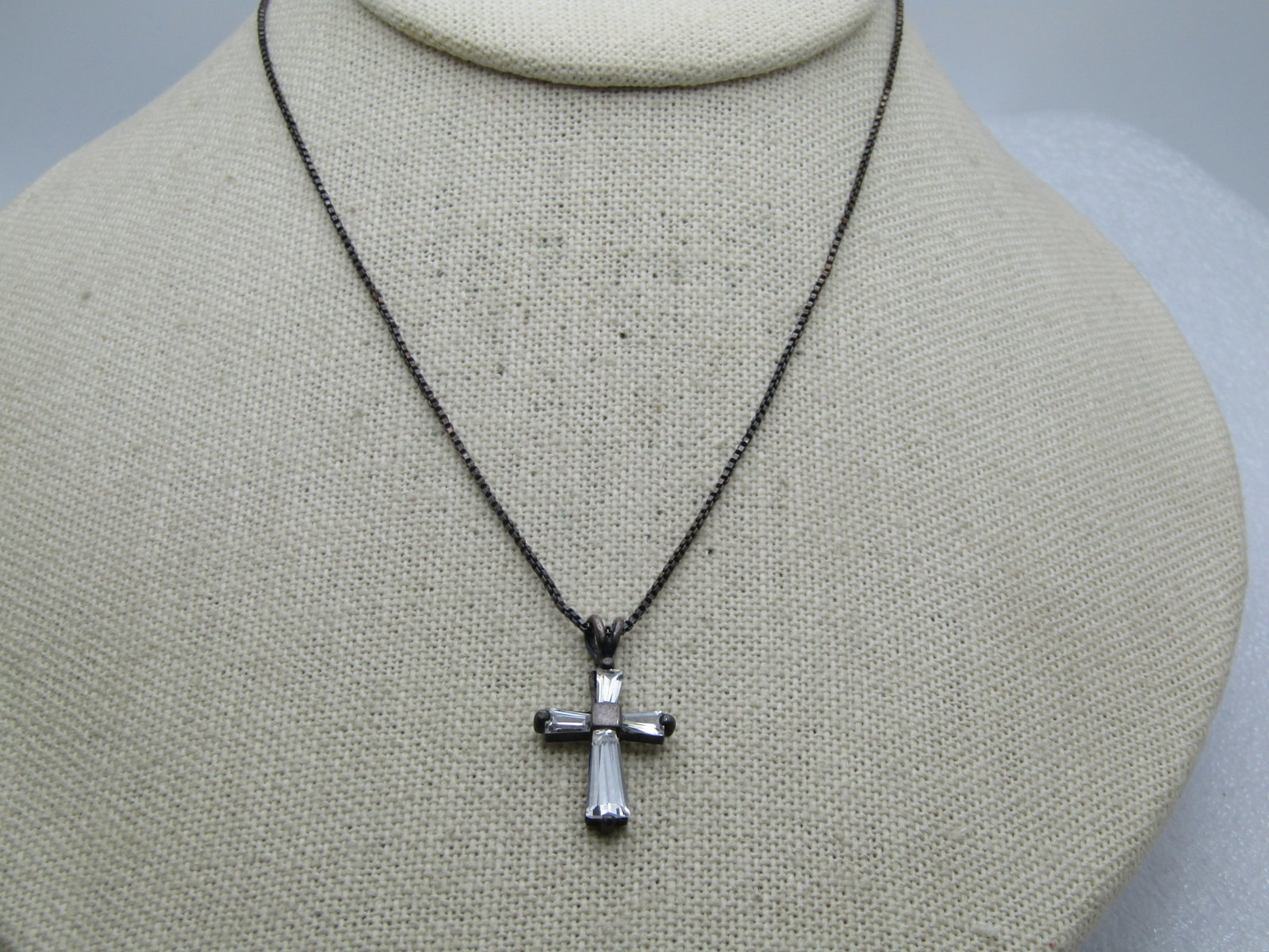 Vintage Sterling Rhinestone Cross Necklace, 18", 1980's: Vintage Sterling Rhinestone Cross Necklace, 18", 1980's. The front of the cross has rhinestone baguettes except for the center which is a square sterling block at the intersection. Open V. Bail. The c