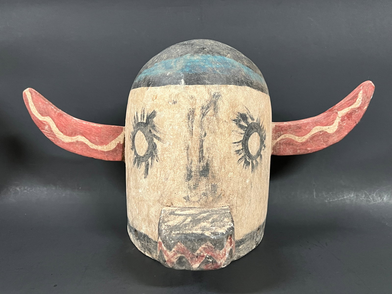 Carved Wooden Kachina Mask: Title: Carved Wooden Kachina Mask Description: Carved Wooden Kachina Mask Date/Period: Late 20th Century Materials: Wood Size: 12" h x 15" w Reserve: $100.00 Shipping: Domestic: Flat-rate of $40.00