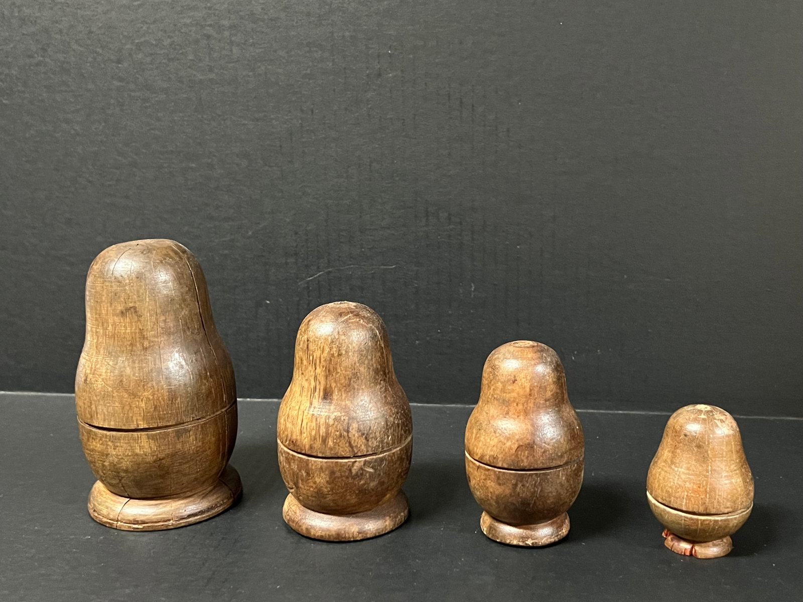Carved Wooden Nesting Doll Sculpture: Title: Carved Wooden Nesting Doll Sculpture Description: Folk Art Carved Wooden Nesting Doll Date/Period: Late 20th Century Materials: Wood Size: 4.75" h x 3.5" w Reserve: $60.00 Shipping: Domestic: