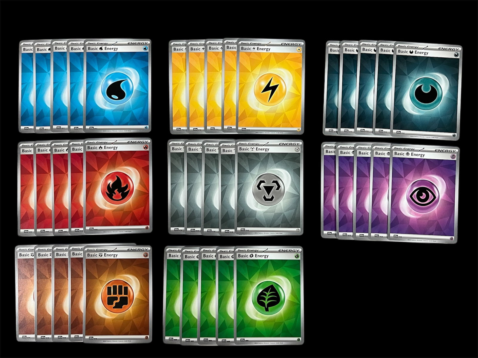 100 X Pokemon Trading Card Assorted Energy Cards: Title: 100 X Pokemon Trading Card Assorted Energy Cards Description: 100 X Pokemon Trading Cards Assorted Energy Cards Date/Period: Late 20th Century Materials: Paper Size: 3.5" h x 2.5" w Reserve: $5