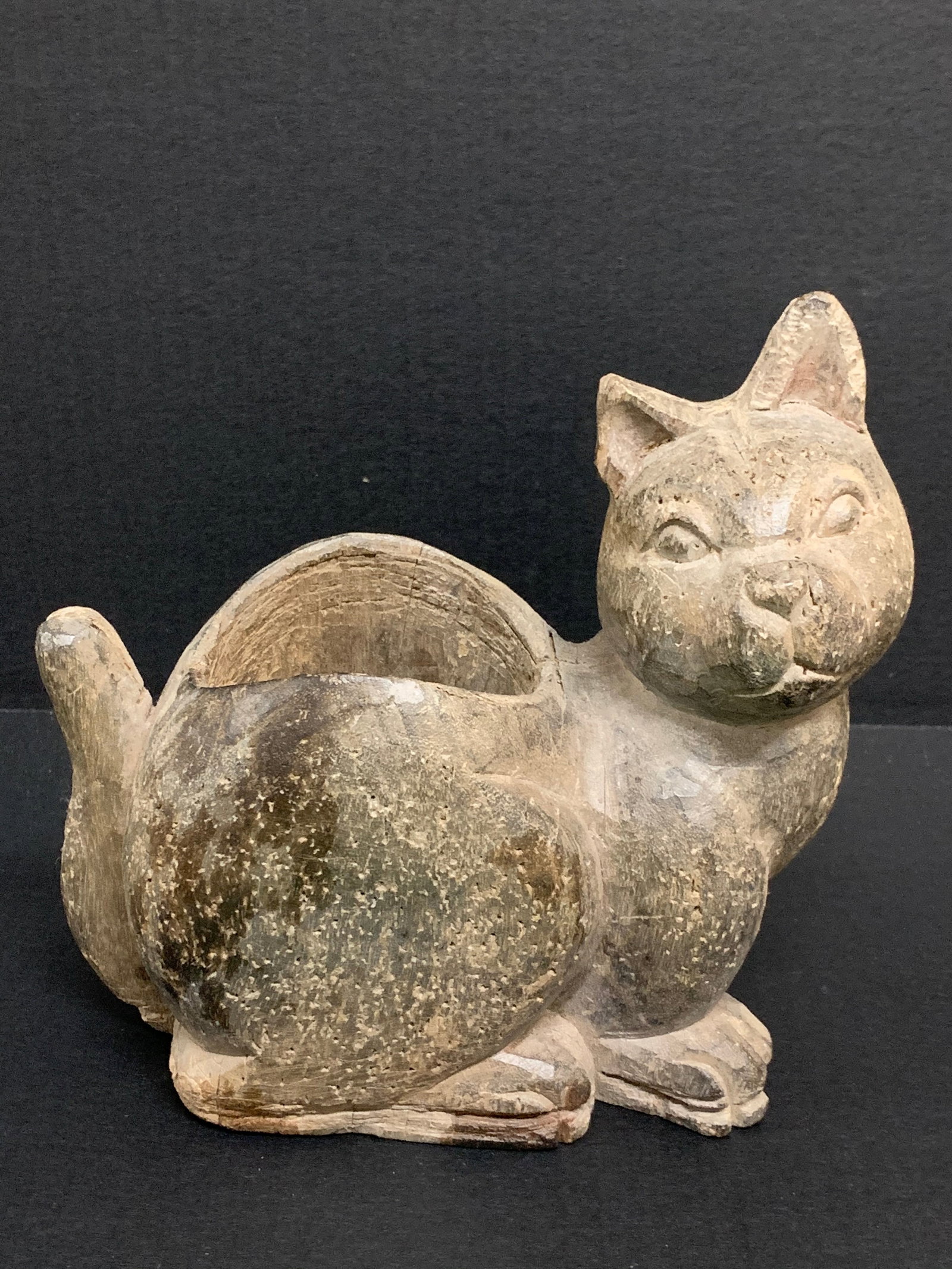 Carved Wooden Cat Sculptutre: Title: Carved Wooden Cat Sculptutre Description: Folk Art Carved Wooden Cat Sculpture Date/Period: Late 20th Century Materials: Wood Size: 6" h x 8.25" w Reserve: $60.00 Shipping: Domestic: Flat-rate