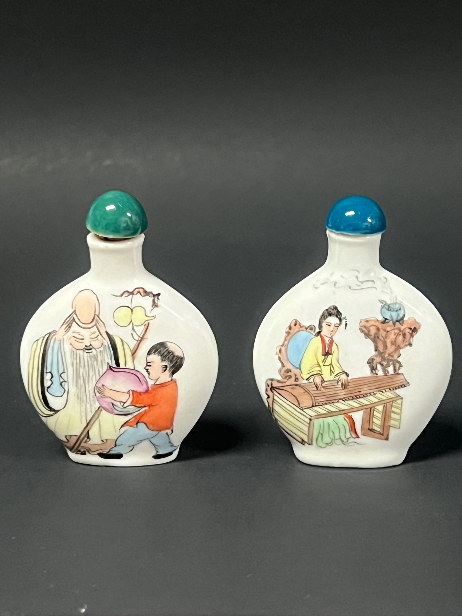 Chinese PorceLain Snuff Bottle Lot of 2: Title: Chinese PorceLain Snuff Bottle Lot of 2 Description: Chinese Art Porcelain Snuff Bottle Date/Period: Late 20th Century Materials: Porcelain Size: 3" h x " w Reserve: $30.00 Shipping: Domestic: