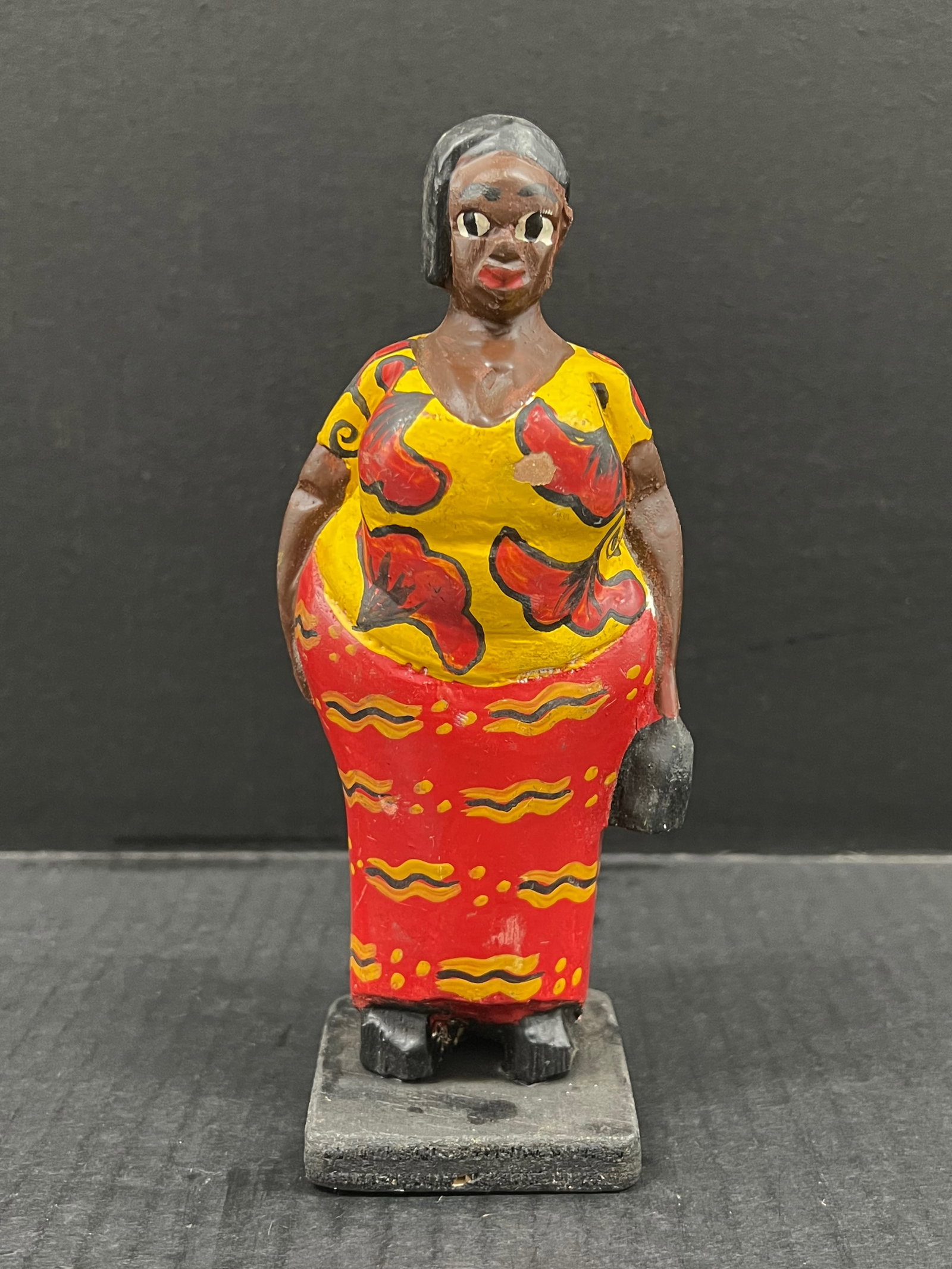 African Tribal Art Carved Wood Colonial Statue: Title: African Tribal Art Carved Wood Colonial Statue Description: African Tribal Art Carved Wood Colonial Statue Date/Period: Late 20th Century Materials: Wood Size: 6.75'' h x 2.75" w Reserve: