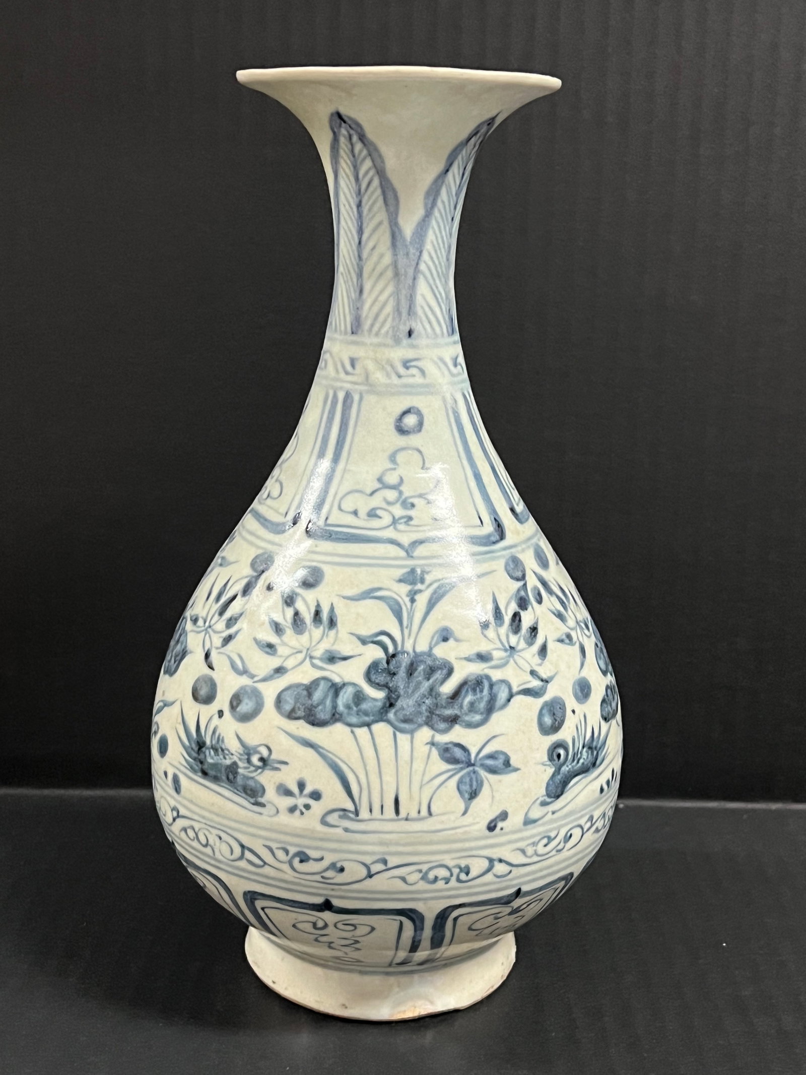 Chinese Art Porcelain Blue and White Vase: Title: Chinese Art Porcelain Blue and White Vase Description: Chinese Art Porcelain Blue and White Vase Date/Period: Late 20th Century Materials: Wood Size: 10" h x 5" w Reserve: $200.00 Shipping: