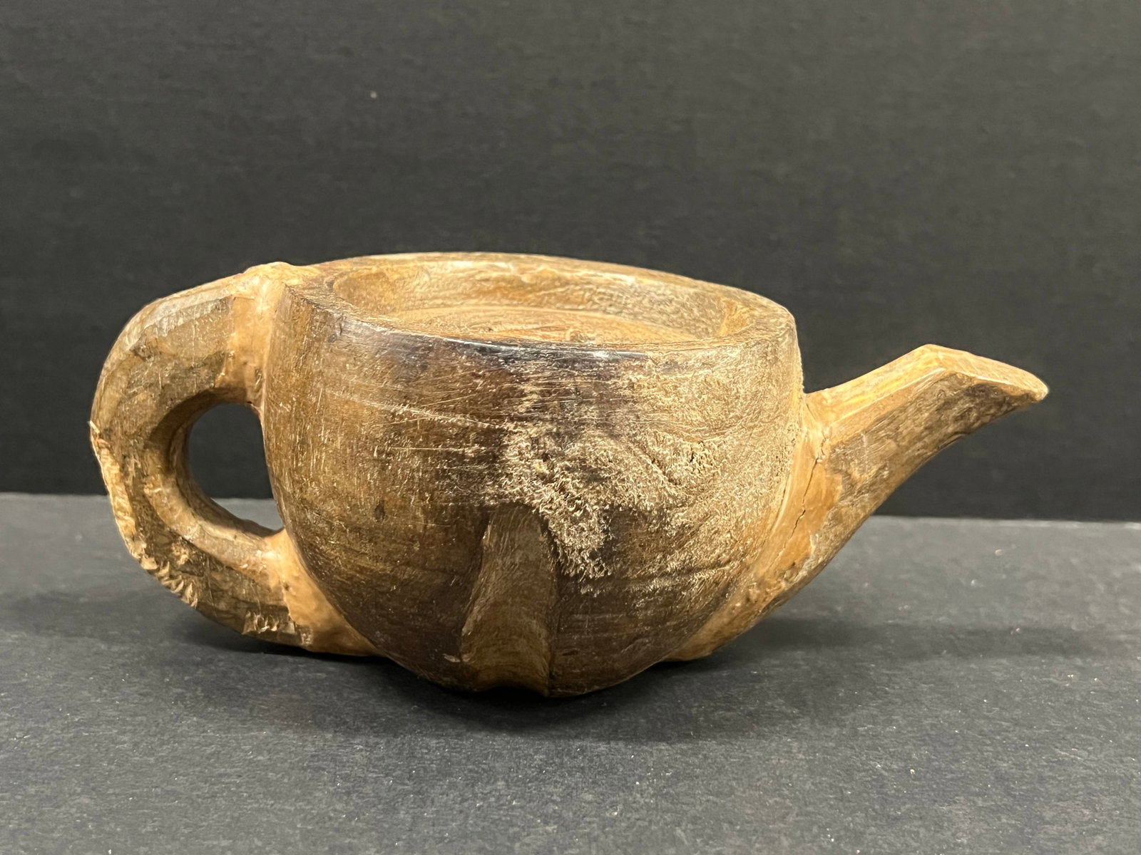 Carved Wood Tea Pot Sculpture: Title: Carved Wood Tea Pot Sculpture Description: Carved Wood Tea Pot Sculpture Date/Period: Late 20th Century Materials: Wood Size: 3" h x 6" w Reserve: $40.00 Shipping: Domestic: Flat-rate of