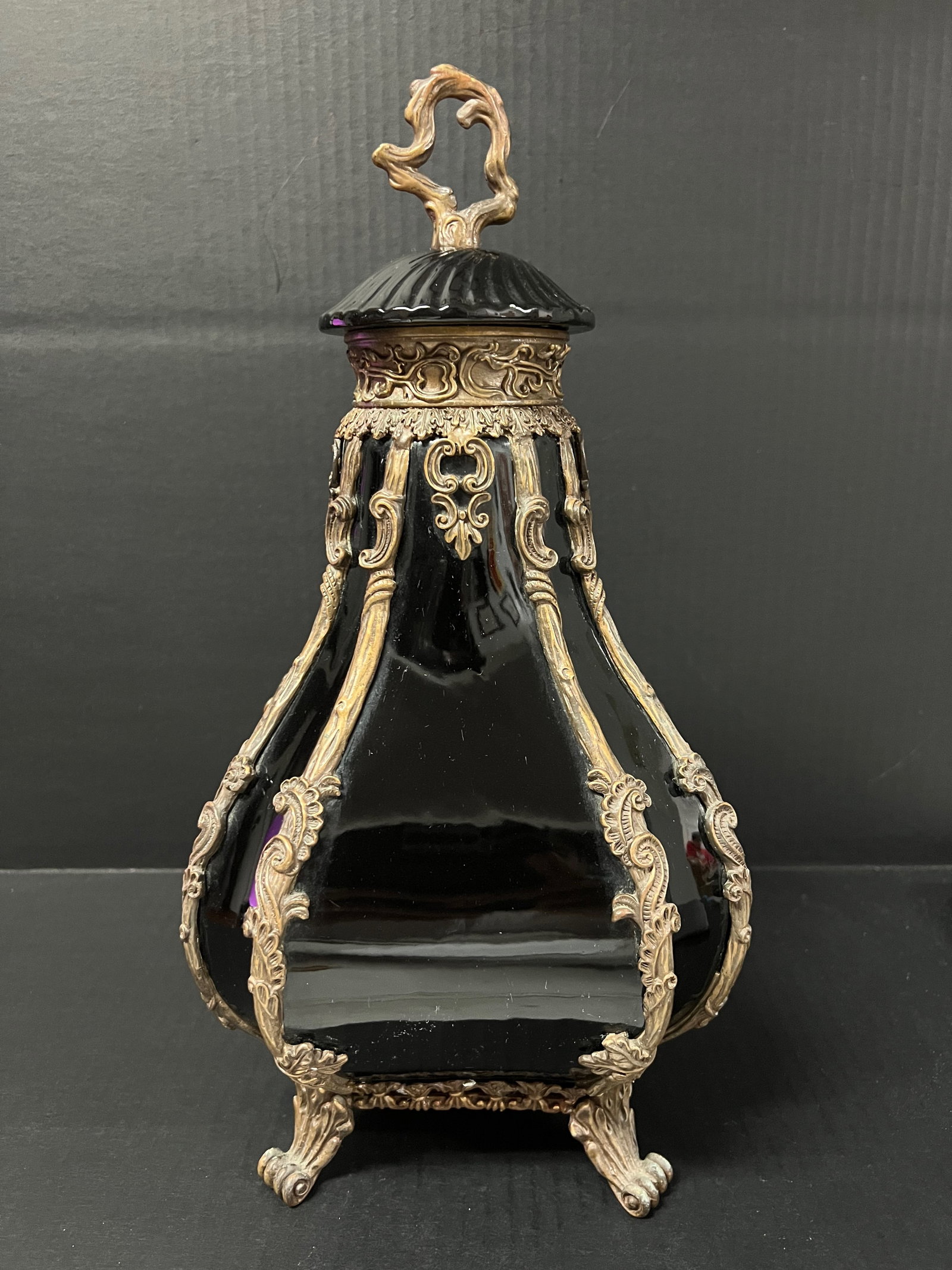 Vintage Black Porcelain and Bronze Vase: Title: Vintage Black Porcelain and Bronze Vase Description: Vintage Black Porcelain and Bronze Vase Date/Period: Late 20th Century Materials: Porcelain Size: 14.5" h x 7.5" w Reserve: $200.00