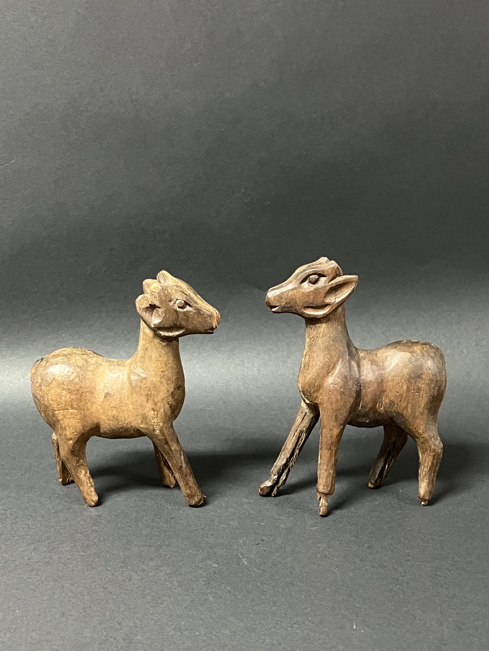 Carved Wood Pair of Deer Sculpture: Title: Carved Wood Pair of Deer Sculpture Description: Carved Wood Pair of Deer Sculpture Date/Period: Late 20th Century Materials: Wood Size: 6.75" h x 5" w Reserve: $40.00 Shipping: Domestic: