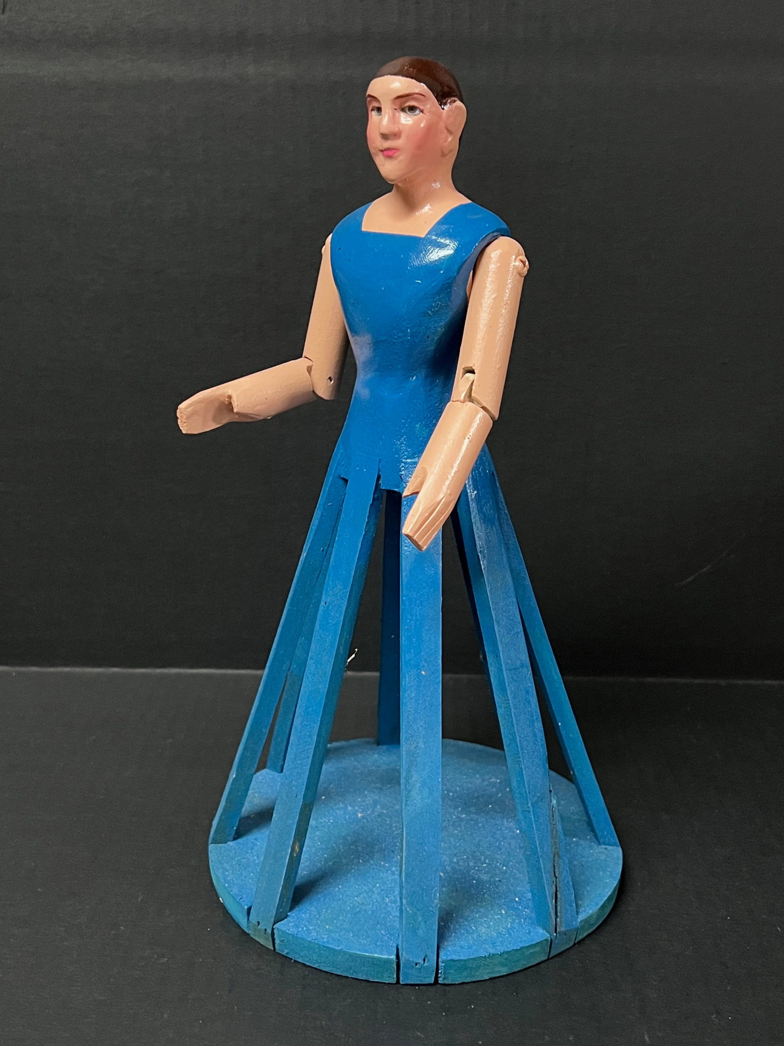 Carved Wood Cage Doll Statue: Title: Carved Wood Cage Doll Statue Description: Carved Wood Cage Doll Statue Date/Period: Late 20th Century Materials: Wood Size: 12" h x 7" w Reserve: $60.00 Shipping: Domestic: Flat-rate of $30.00