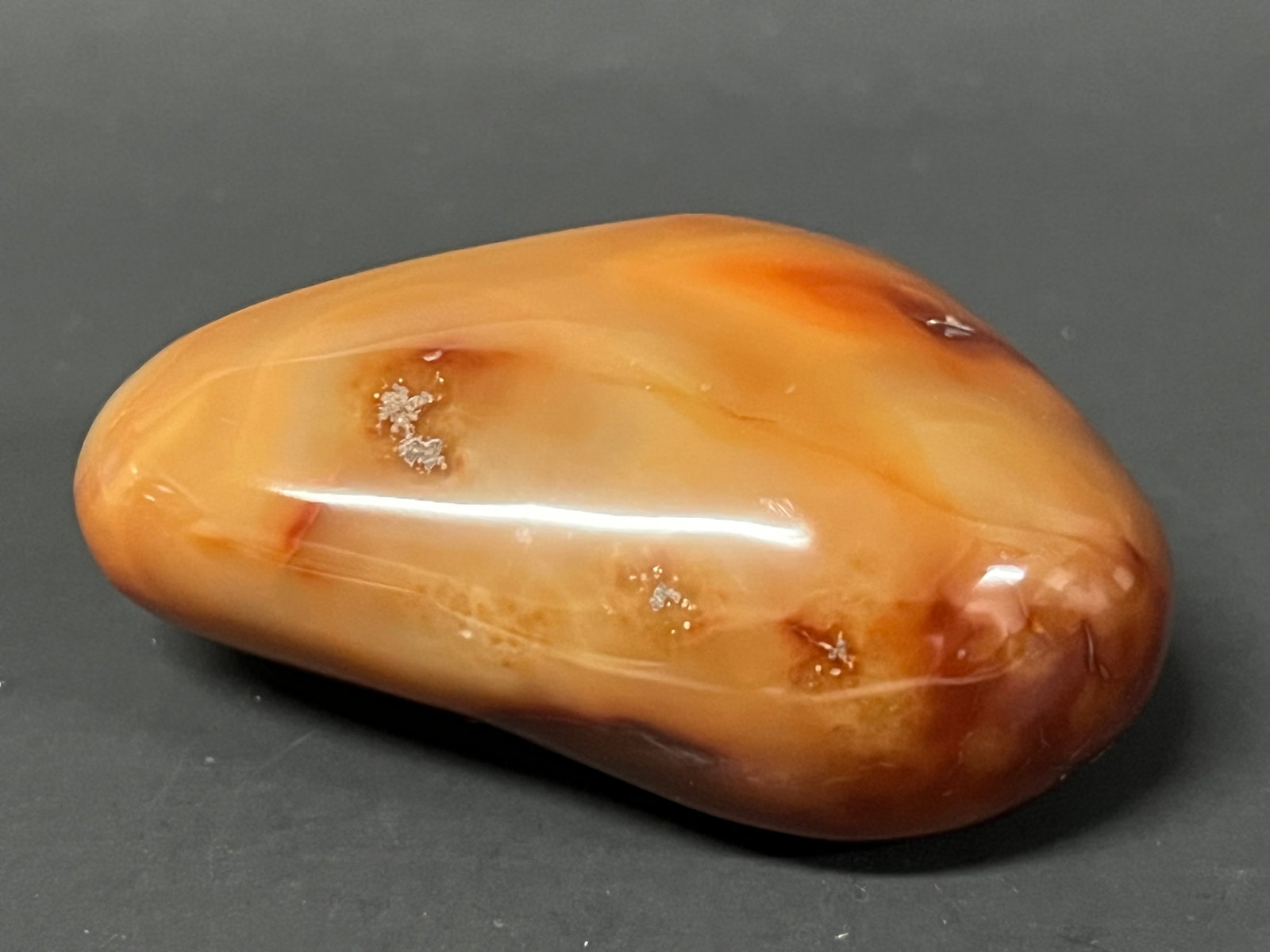 Carved Agate Healing Stone: Title: Carved Agate Healing Stone Description: Carved Agate Healing Stone Date/Period: Late 20th Century Materials: Agate Size: 2" h x 3" w Reserve: $40.00 Shipping: Domestic: Flat-rate of $20.00 to