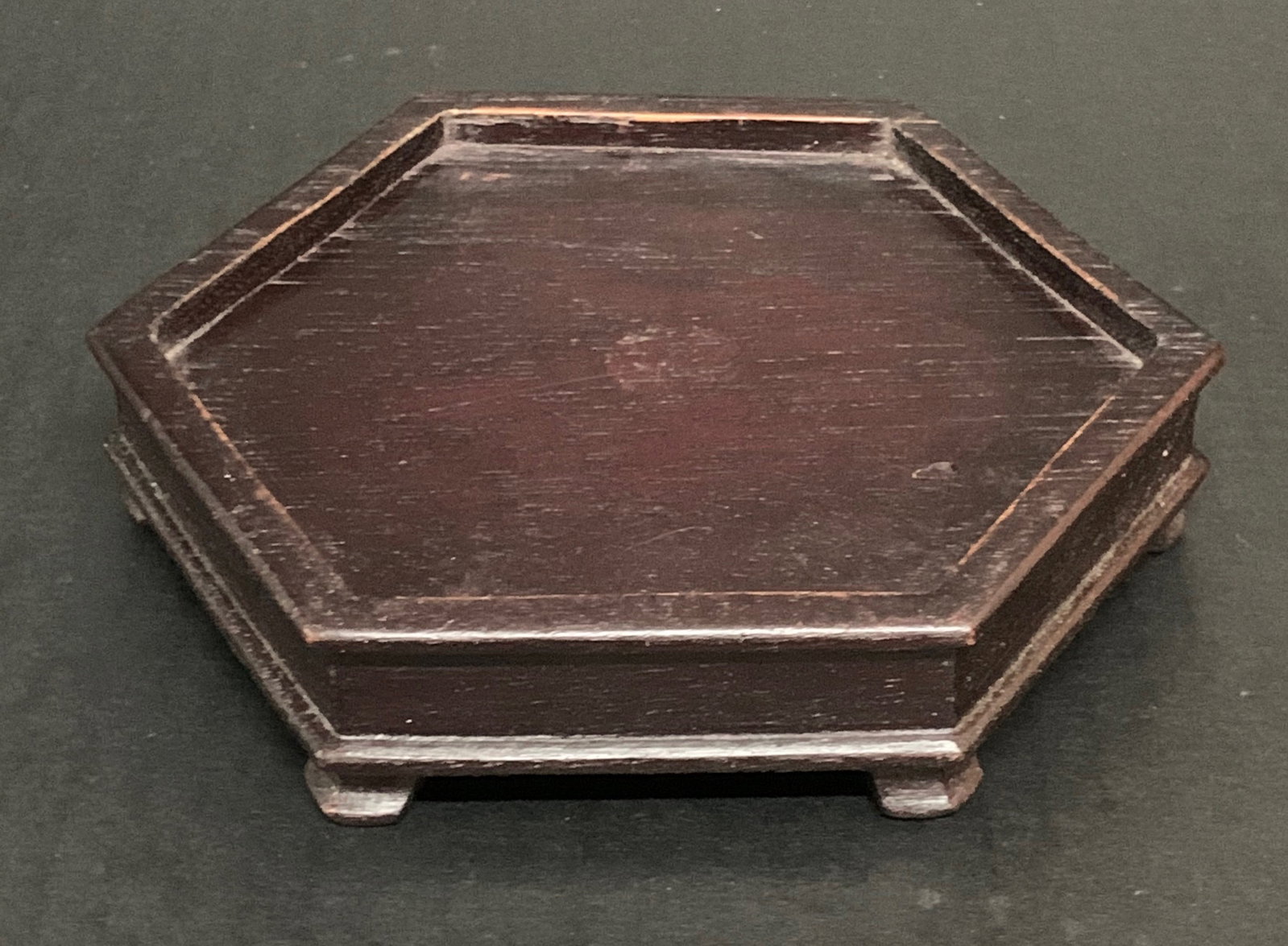 Chinese Art Carved Wooden Display Base: Title: Chinese Art Carved Wooden Display Base Description: Chinese Art Carved Wooden Display Base Date/Period: Late 20th Century Materials: Wood Size: 1.25" h x 6" w Reserve: $40.00 Shipping: