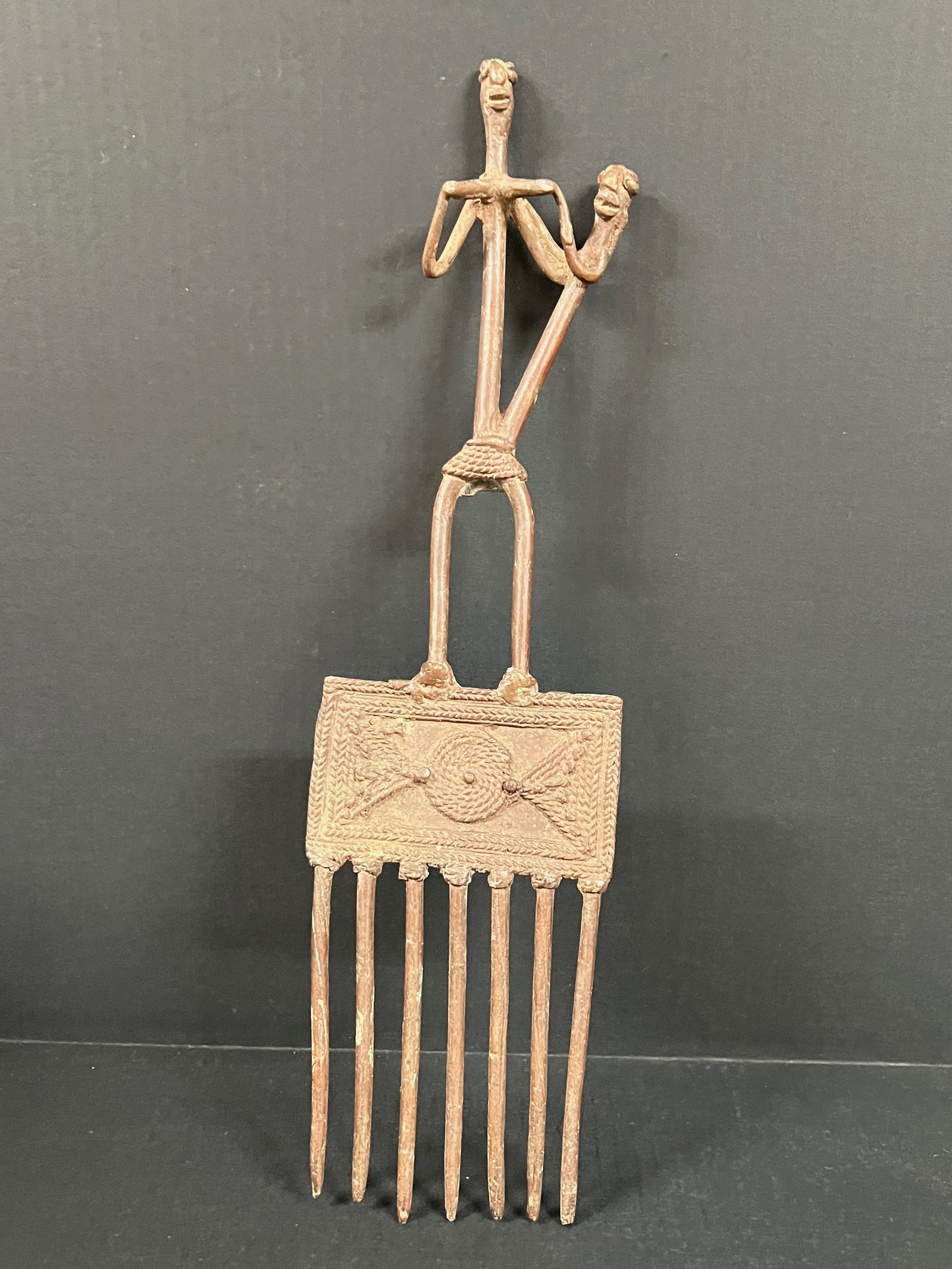 Dogon Bronze Comb: Title: Dogon Bronze Comb Description: African Tribal Art Dogon Bronze Comb Date/Period: Late 20th Century Materials: Bronze Size: 18.25" h x 5" w Reserve: $150.00 Shipping: Domestic: Flat-rate of
