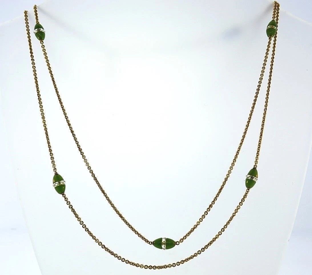 14k Yellow Gold Chrysoprase and Chrystal Chain: Title: 14k Yellow Gold Chrysoprase and Chrystal Chain Description: NS G00 14k Yellow Gold Chrysoprase and Chrystal Chain with lobster clasp Measurements: Length is 40 inches Weight is 13 grams In