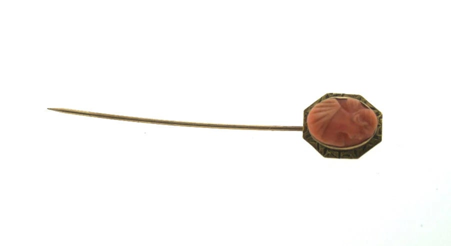 C.1900 VICTORIAN STICK PIN CARVED CORAL CAMEO 9K YELLOW GOLD: Title: C.1900 VICTORIAN STICK PIN CARVED CORAL CAMEO 9K YELLOW GOLD Description: N-JOO CHIC C. 1900 VICTORIAN CORAL & 9K YELLOW GOLD STICK PIN MEASURES 2 1/8'' X 7/16'' WEIGHT 1.0 G The proudly offers