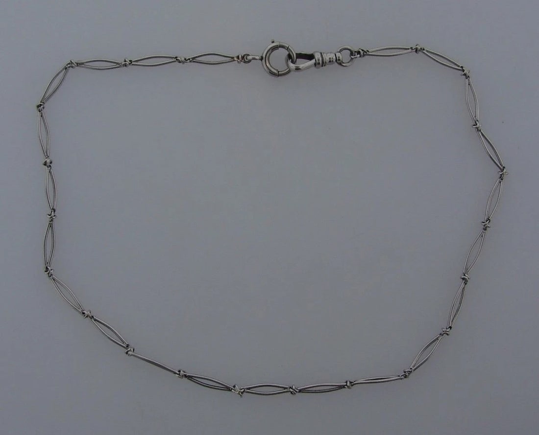 TIMELESS 14k White Gold Watch Chain: Title: TIMELESS 14k White Gold Watch Chain Description: DK 14k White Gold Watch Chain · Wonderful watch chain that is a necessity in your collection. · The weight is 10.7 grams. · The l