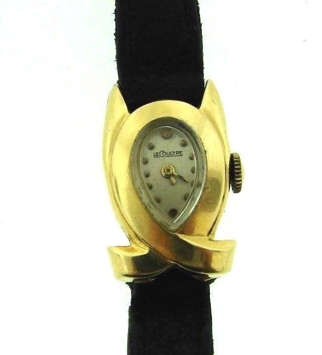 LECOULTRE VINTAGE RETRO WATCH C1940 14K YELLOW GOLD LEATHER STRAP STAMPED: Title: LECOULTRE VINTAGE RETRO WATCH C1940 14K YELLOW GOLD LEATHER STRAP STAMPED Description: N-NRO VINTAGE C.1940 14K YELLOW GOLD WATCH 14K YELLOW GOLD LEATHER STRAP FEMININE WATCH INTERESTING AND