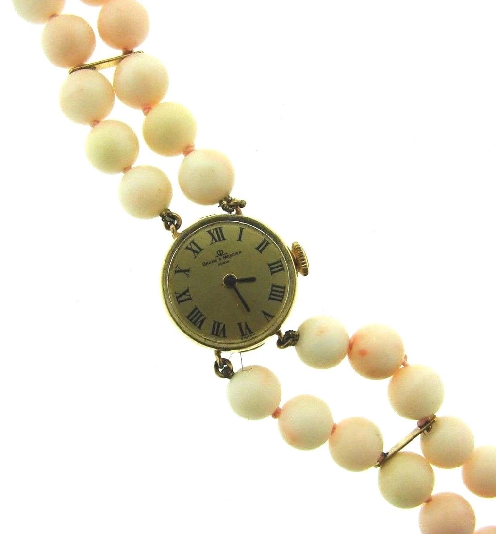 CHIC Baume & Mercier 14k Yellow Gold & Angel Skin Coral Watch Circa 1950s: Title: CHIC Baume & Mercier 14k Yellow Gold & Angel Skin Coral Watch Circa 1950s Description: DK Baume & Mercier 14k Yellow Gold & Angel Skin Coral Watch Circa 1950s · Wonderful watch that is a