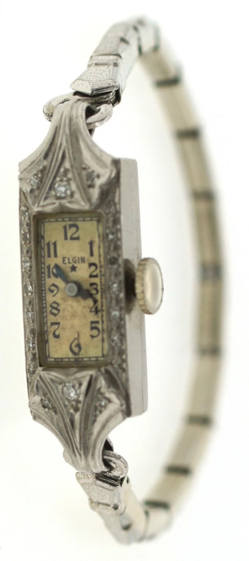 ELEGANT Elgin Platinum, Silver & Diamond Watch Circa 1920!: Title: ELEGANT Elgin Platinum, Silver & Diamond Watch Circa 1920! Description: s DK Elgin Platinum, Silver & Diamond Watch on a Stretch Bracelet This unique and wonderful watch is made by Elgin. It