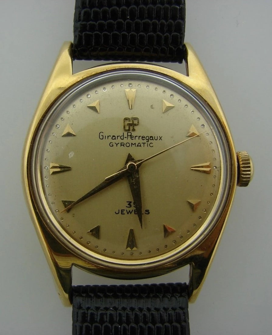 GIRARD PERREGAUX GYROMATIC 39 JEWELS WATCH LEATHER STRAP 14K YELLOW GOLD: Title: GIRARD PERREGAUX GYROMATIC 39 JEWELS WATCH LEATHER STRAP 14K YELLOW GOLD Description: N-JJOO VK GIRARD PERREGAUX GYROMATIC 39 JEWELS LEATHER STRAP VINTAGE WATCH 14 karat YELLOW GOLD BEZEL 33 MM