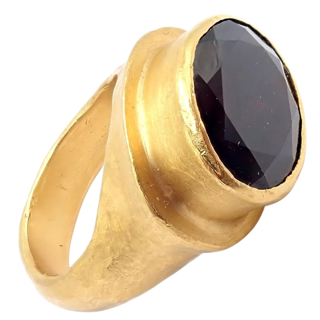 Authentic! Yossi Harari Hammered 24k Yellow Gold Large Garnet Ring sz 7: A bold Yossi Harari ring crafted in richly textured 24k hammered yellow gold, showcasing a large, faceted deep garnet centerpiece. The organic, sculptural form reflects ancient-inspired design with mo