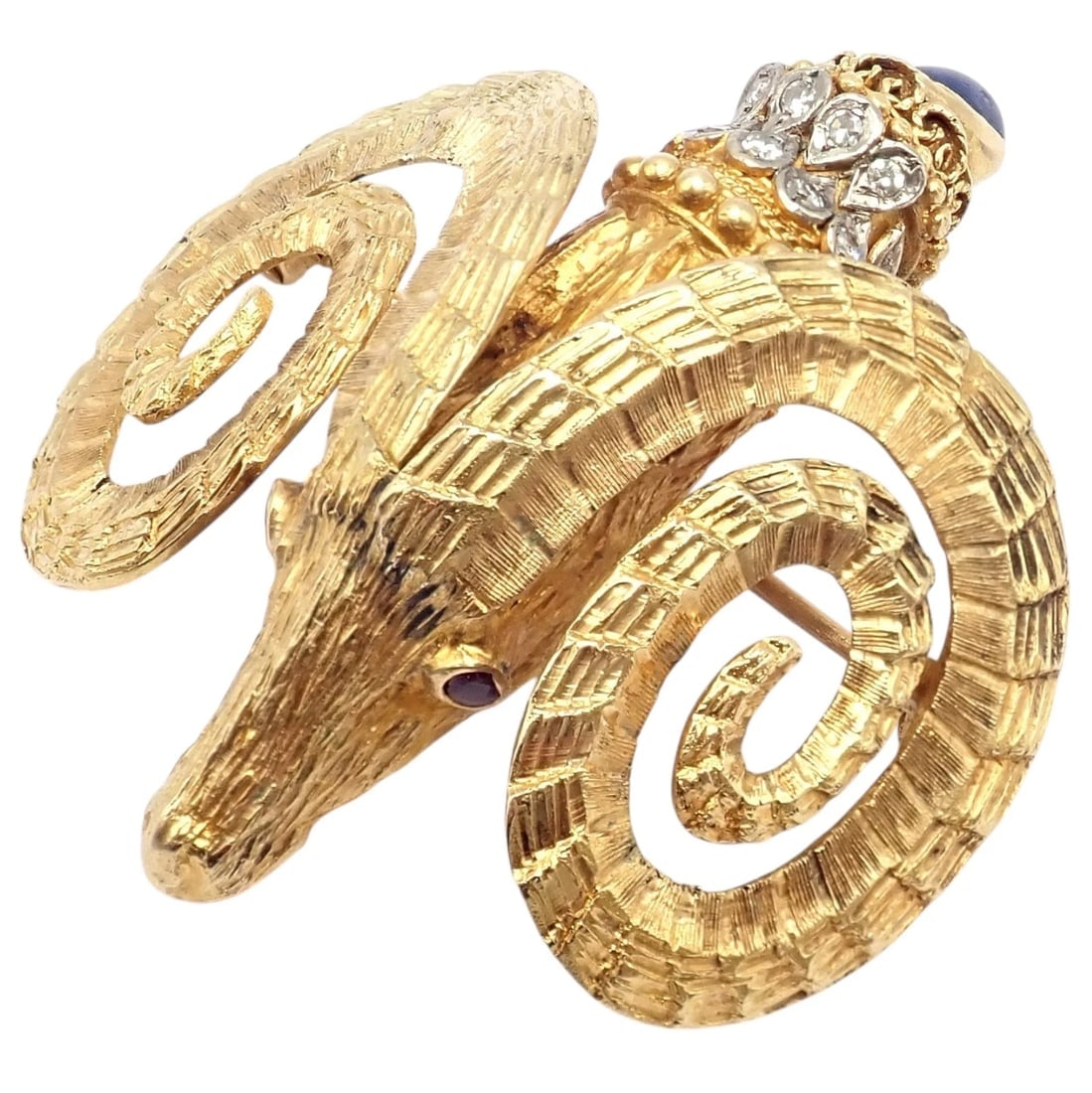 Rare Ilias Lalaounis 18k Yellow Gold Ram Ares Diamond Ruby Sapphire Large Brooch: This rare Greek Ilias Lalaounis brooch showcases exquisite artistry in 18k yellow gold, sculpted as a majestic ram symbolizing Ares, the god of war. Adorned with brilliant diamonds, deep ruby eyes, an