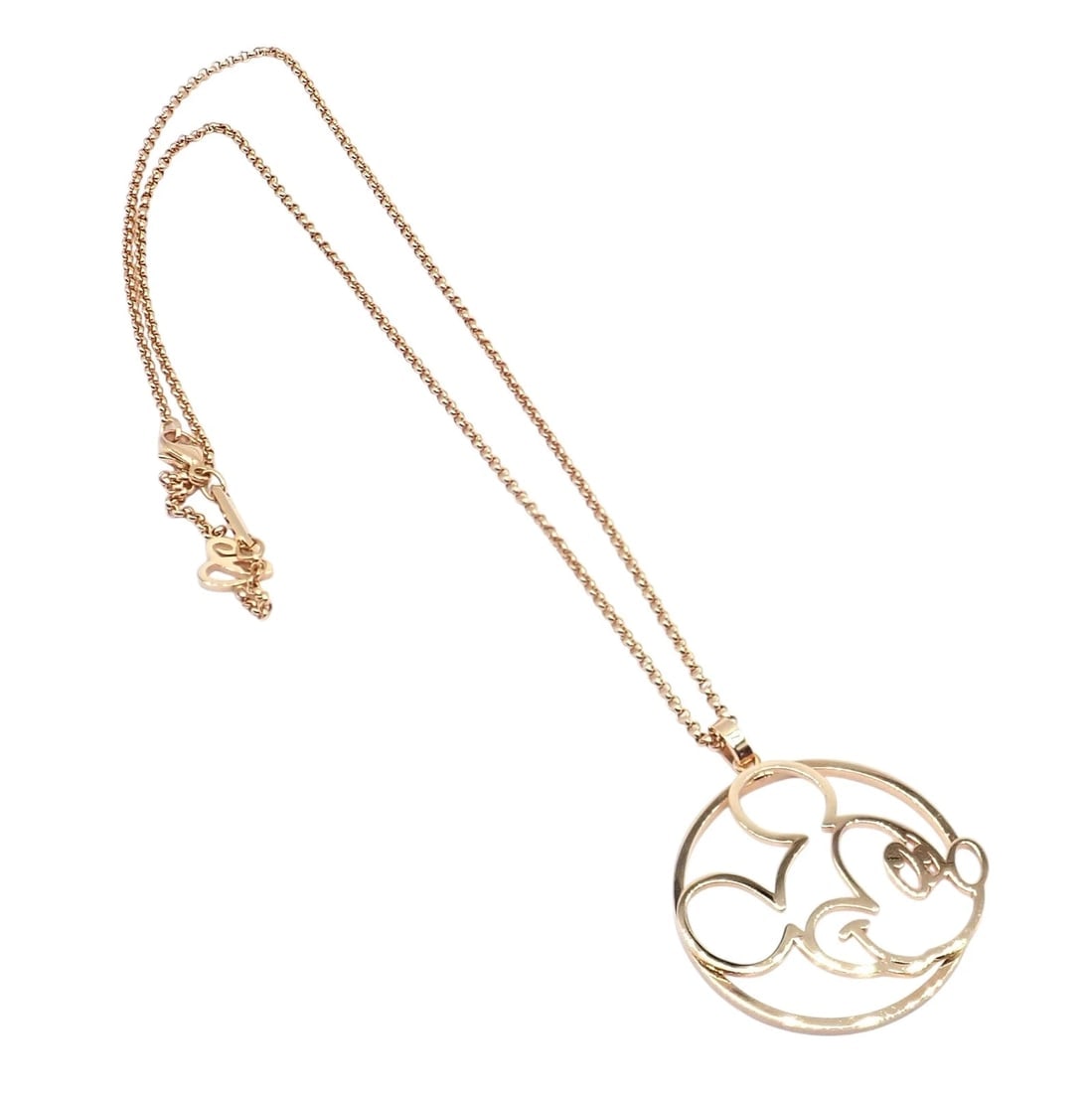 Rare! Chopard Disney World 18k Rose Gold Mickey Mouse Necklace: This collectible Chopard Disney World necklace features an elegant 18k rose gold pendant depicting a modern, open-work Mickey Mouse silhouette. Suspended from a fine rose gold chain, it blends luxury