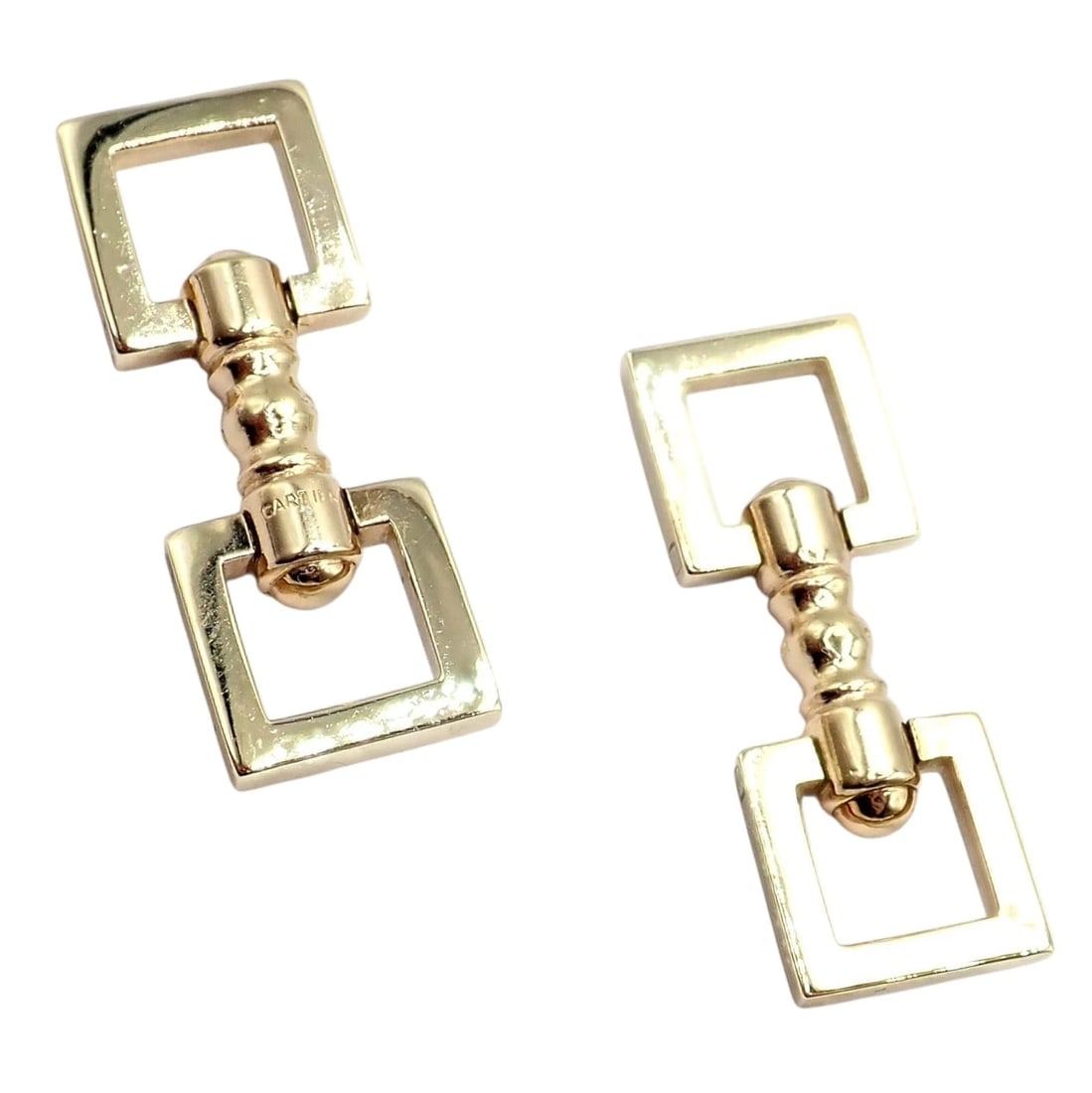 Rare! Vintage Cartier 14k Yellow Gold Square Spring Clasp Cufflinks 1960's: Vintage 1960s Cartier cufflinks crafted in 14k yellow gold, featuring bold square frames that are spring set and are elegant. Sleek, geometric, and refined, they embody mid-century Cartier sophisticat