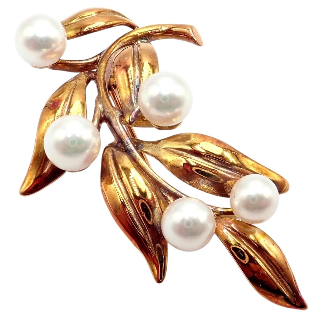 Vintage Tiffany & Co 18k Gold 5 Pearl Leaf Branch Pin Brooch 1987: Vintage Tiffany & Co. 18k gold brooch designed as an elegant leaf branch accented with five luminous pearls. Sculpted, flowing leaves add warmth and movement, while the pearls bring timeless refinemen