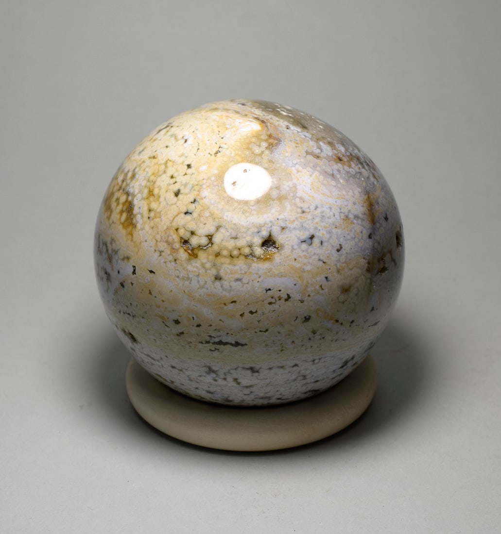 6.7 cm Polished Ocean Jasper sphere: Title: 6.7 cm Polished Ocean Jasper sphere Origin: Madagascar Size: 6.7 cm diameter Description: Species: Jasper (Ocean Jasper) Locality: Madagascar Diameter: 6.7 cm Weight: 0.42 kg Fine polished