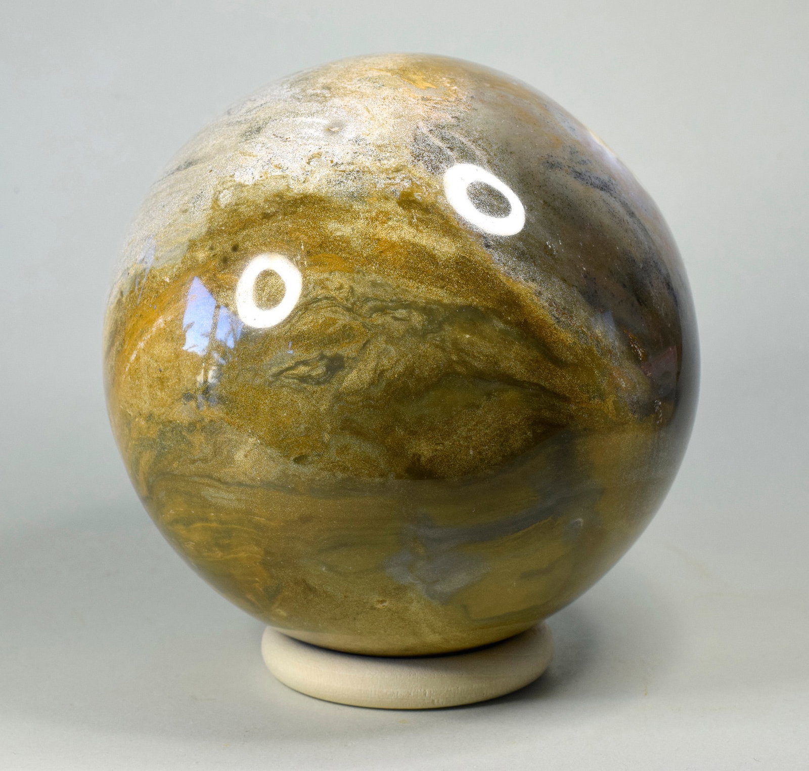 11 cm Polished Ocean Jasper sphere: Title: 11 cm Polished Ocean Jasper sphere Origin: Madagascar Size: 11 cm diameter Description: Species: Jasper (Ocean Jasper) Locality: Madagascar Diameter: 11 cm Weight: 1.82 kg Fine polished ocean