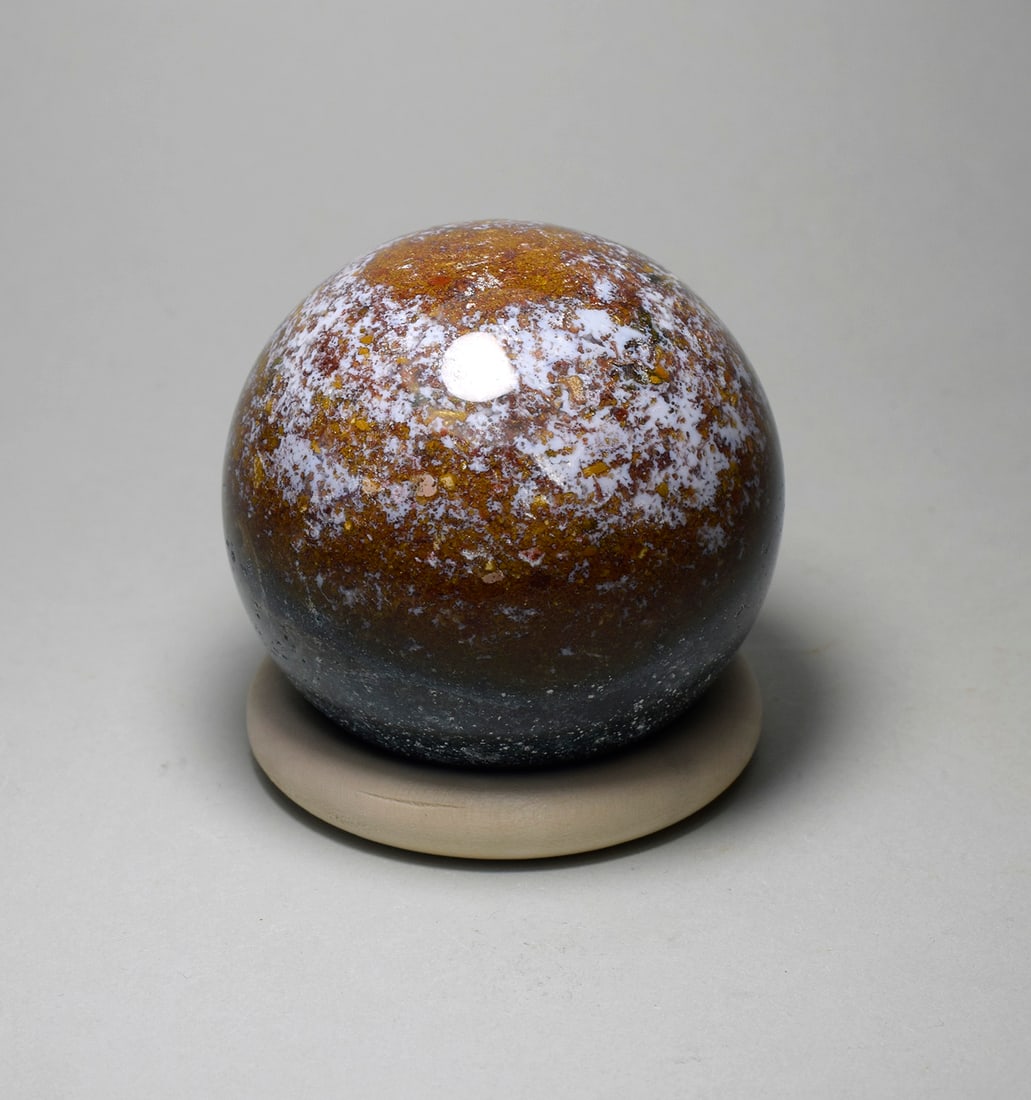 6.0 cm Polished Ocean Jasper sphere: Title: 6.0 cm Polished Ocean Jasper sphere Origin: Madagascar Size: 6.0 cm diameter Description: Species: Jasper (Ocean Jasper) Locality: Madagascar Diameter: 6.0 cm Weight: 0.29 kg Fine polished