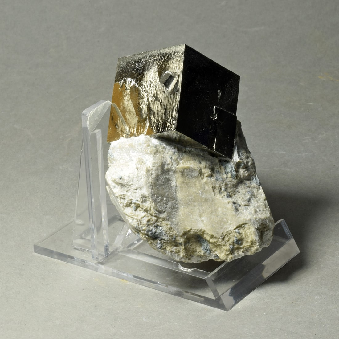 Beautiful Iron pyrite on matrix: Title: Beautiful Iron pyrite on matrix Origin: Spain Size: 26 x 25 x 25 mm main crystal Description: Beautiful natural iron pyrite cluster. Great luster and shape. Very decorative. One gluing present 