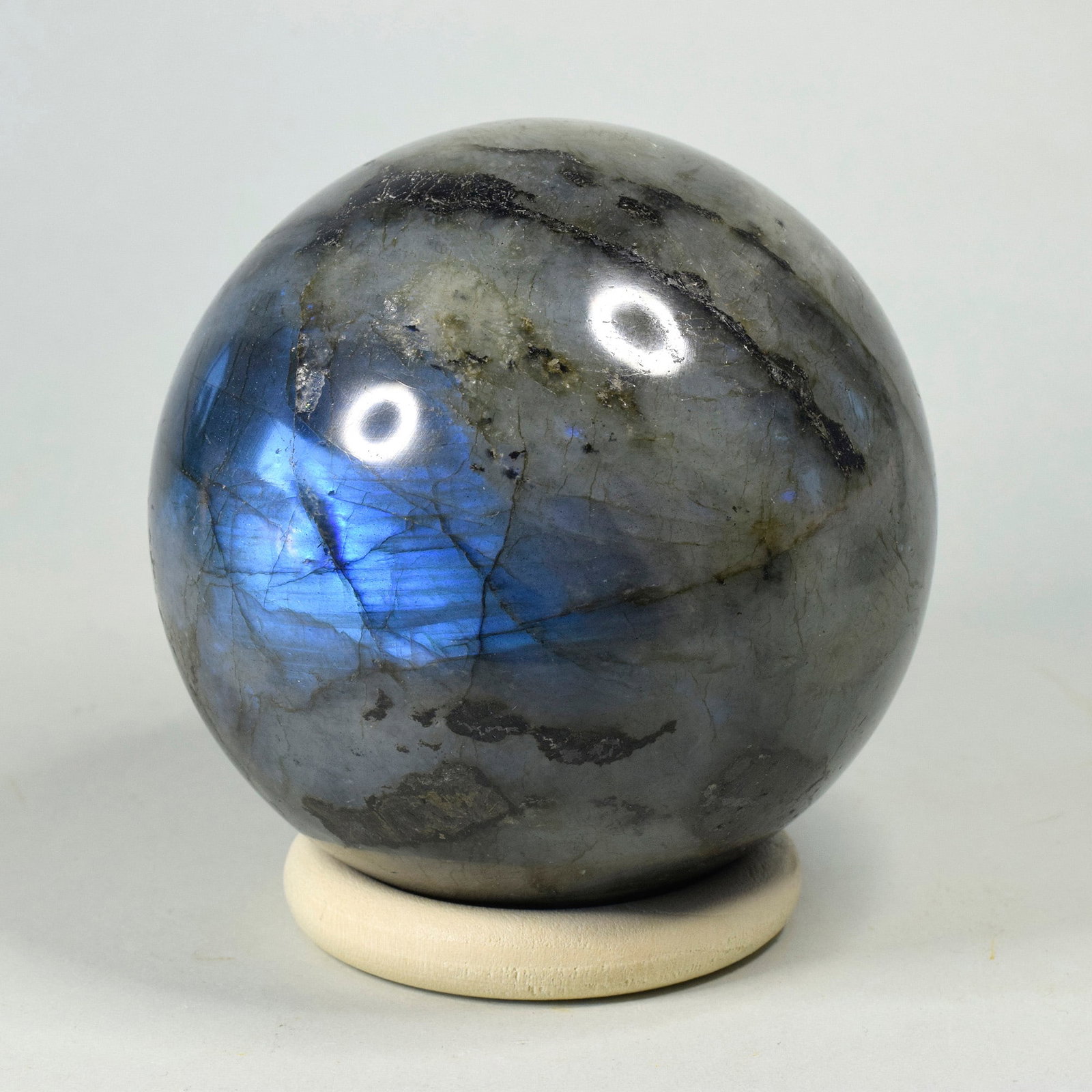 8.2 cm Polished Labradorite sphere: Title: 8.2 cm Polished Labradorite sphere Origin: Madagascar Size: 8.2 cm diameter Description: Species: Labradorite Locality: Madagascar Diameter: 8.2 cm Weight: 0.79 kg Fine polished labradorite sph