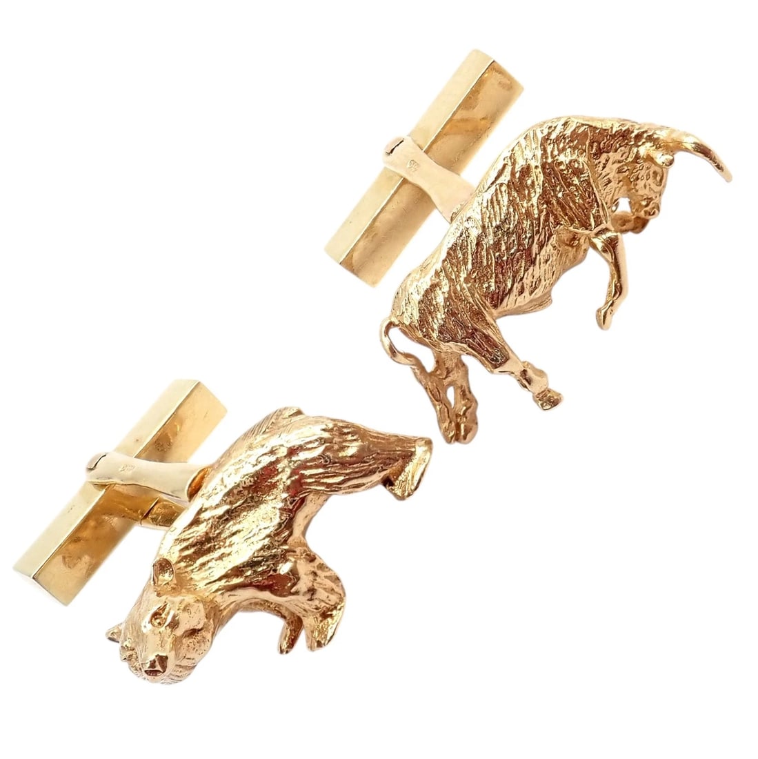 Rare! Vintage Tiffany & Co. 14k Yellow Gold Stock Market Bull Bear Cufflinks: Bold and symbolic, these Vintage Tiffany & Co. 14k yellow gold cufflinks feature the iconic stock market bull and bear in finely sculpted detail. Representing strength and strategy, each figure is ric