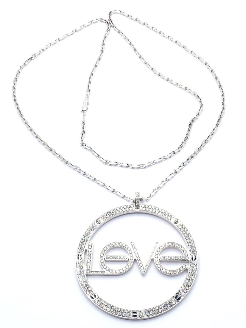Authentic! Cartier 18k White Gold Diamond Ceramic Large Love Pendant Necklace: Authentic! Cartier 18k White Gold Diamond Ceramic Large Love Pendant Necklace About This Piece: Metal: 18k white gold Chain: Length: 31" Width: 3mm Weight: Pendant: 83 grams 2 3/4" without bail