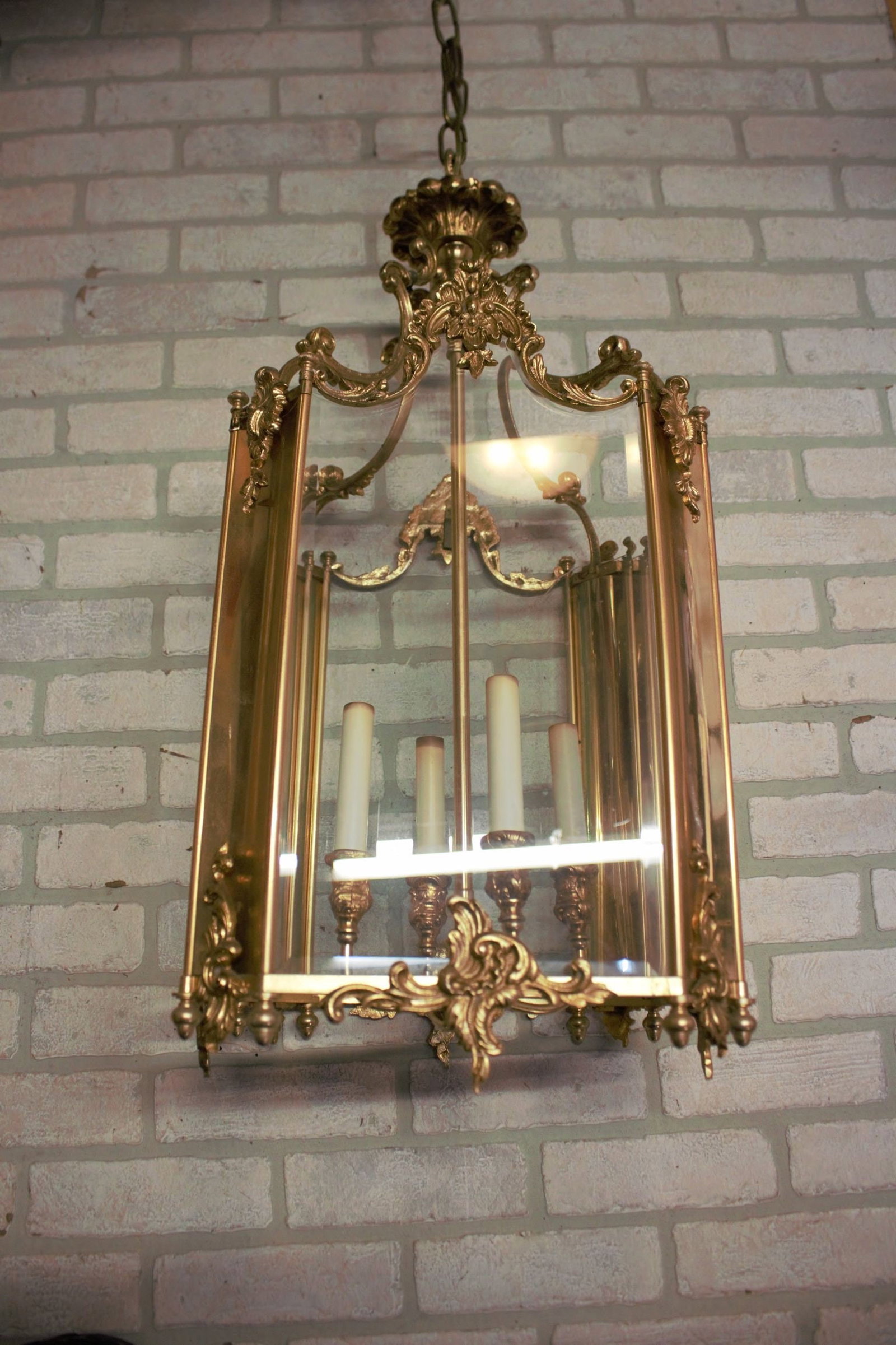 Vintage French Doré Gilt Bronze Louis XV Style Foyer Lantern: Materials: Glass, metalWidth: 13.5 inchesHeight: 29 inchesDepth: 13.5 inchesVintage French Doré Gilt Bronze Louis XV Style Foyer LanternA heavy and well-crafted French doré gilt bronze
