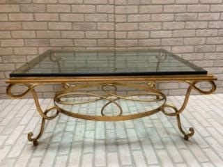 Rene Drouet Style Wrought Iron Coffee Table: Rene Drouet Style Gilt Iron Coffee Table with Thick Beveled Glass Circa 1940 H 17.5"W 40"D 28" Good vintage condition Please be aware that all the items are vintage and may have small defects of