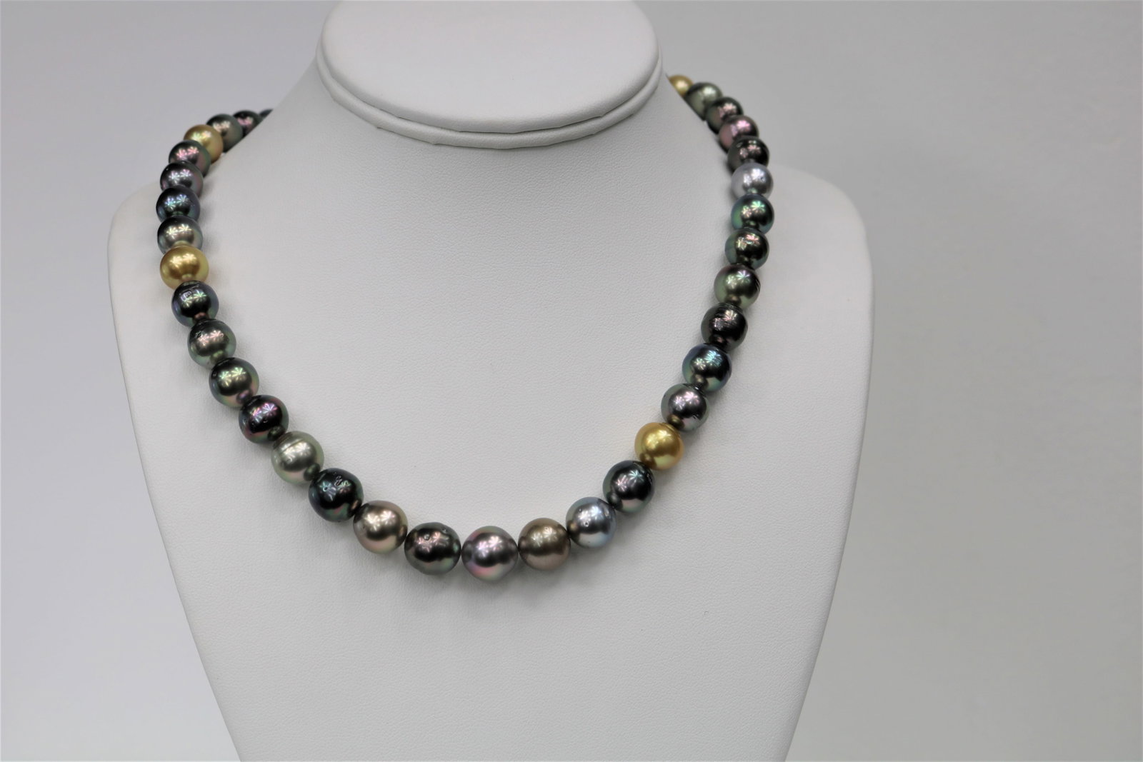 10-12mm Tahitian and Golden South Sea Multi Color Necklace with 14k Clasp: Title:10-12mm Tahitian and Golden South Sea Multi Color Necklace with 14k Clasp Description:Near Round, AAA Luster, Tahitian Multi Color and Gold South Sea Necklace, 37 pearl pieces, 18 inches hand