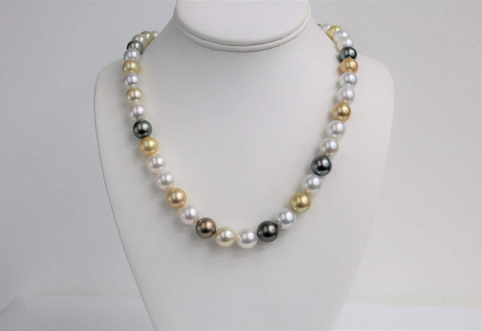 10-12mm Golden South Sea and Tahitian Multi Color Round Necklace with 14k Clasp: Title:10-12mm Golden South Sea and Tahitian Multi Color Round Necklace with 14k Clasp Description:AAA Quality Pearls, AAA Luster, Round/Near Round, 37 pearl pieces, 18 inches hand knotted with 14k YG
